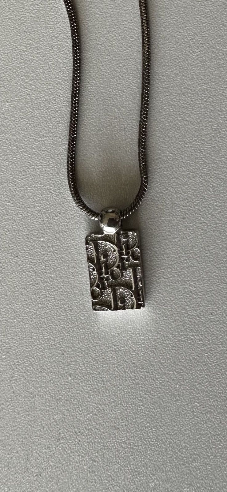 image of Dior Logo Square Pendant in Silver, Men's