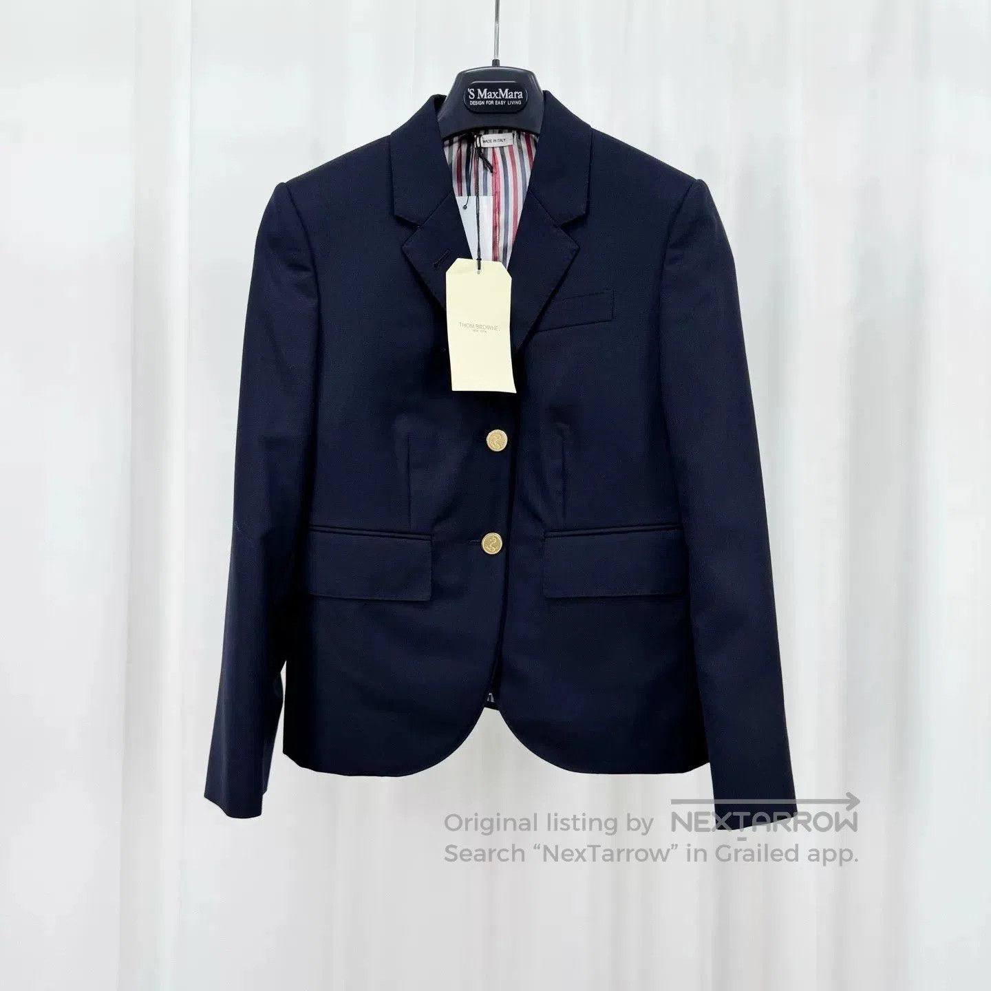 thom browne navy wool blazer with gold buttons.