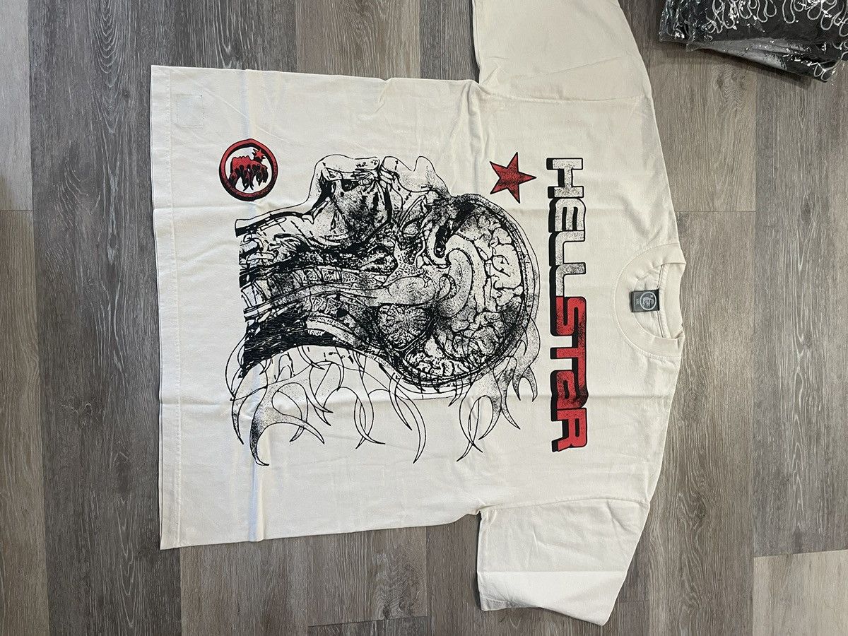 HELLSTAR ヘルスター HUMAN DEVELOPMENT Tシャツ クリーム Hellstar Studios Human Development Cream Tee | Restock AR