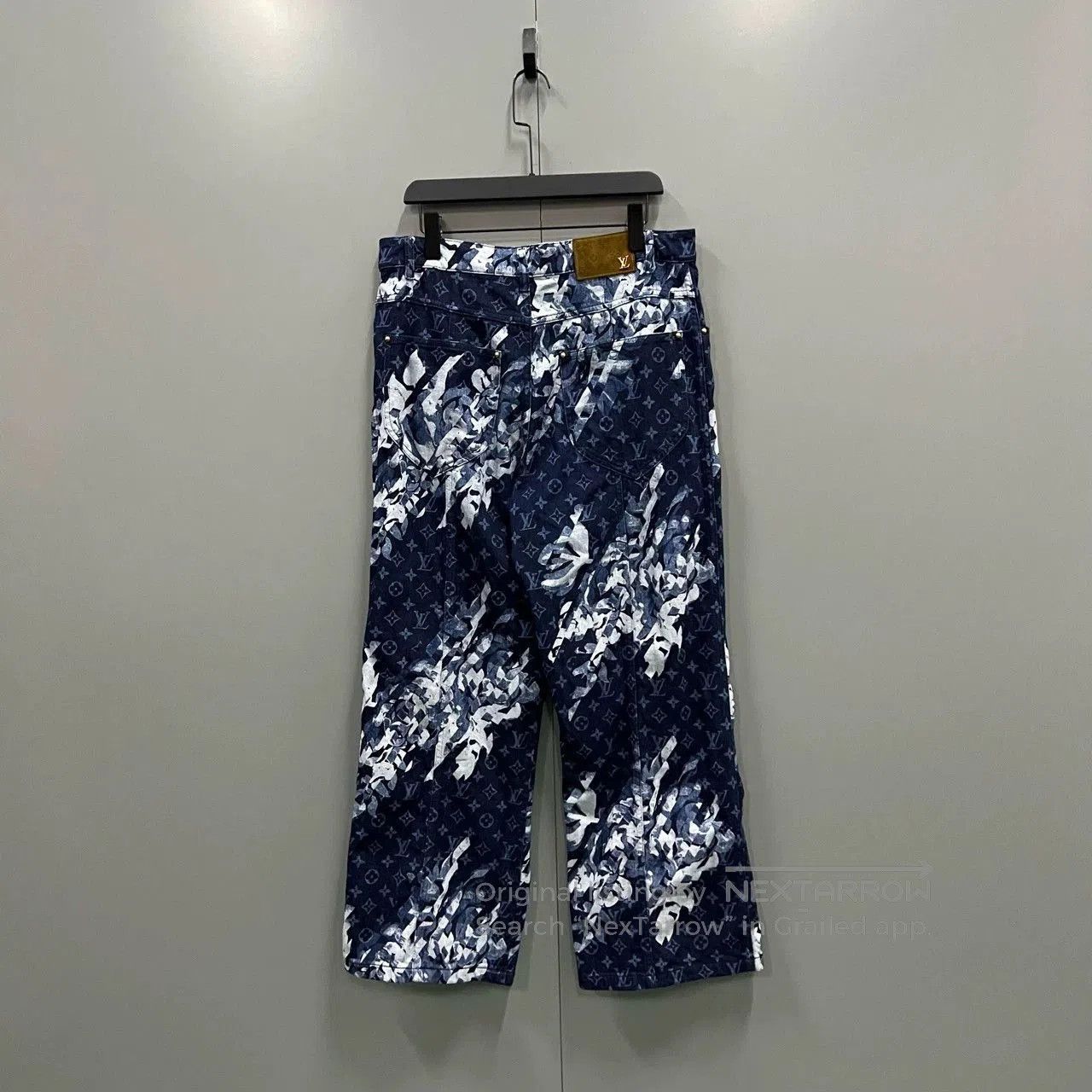 louis vuitton denim pants with monogram print.