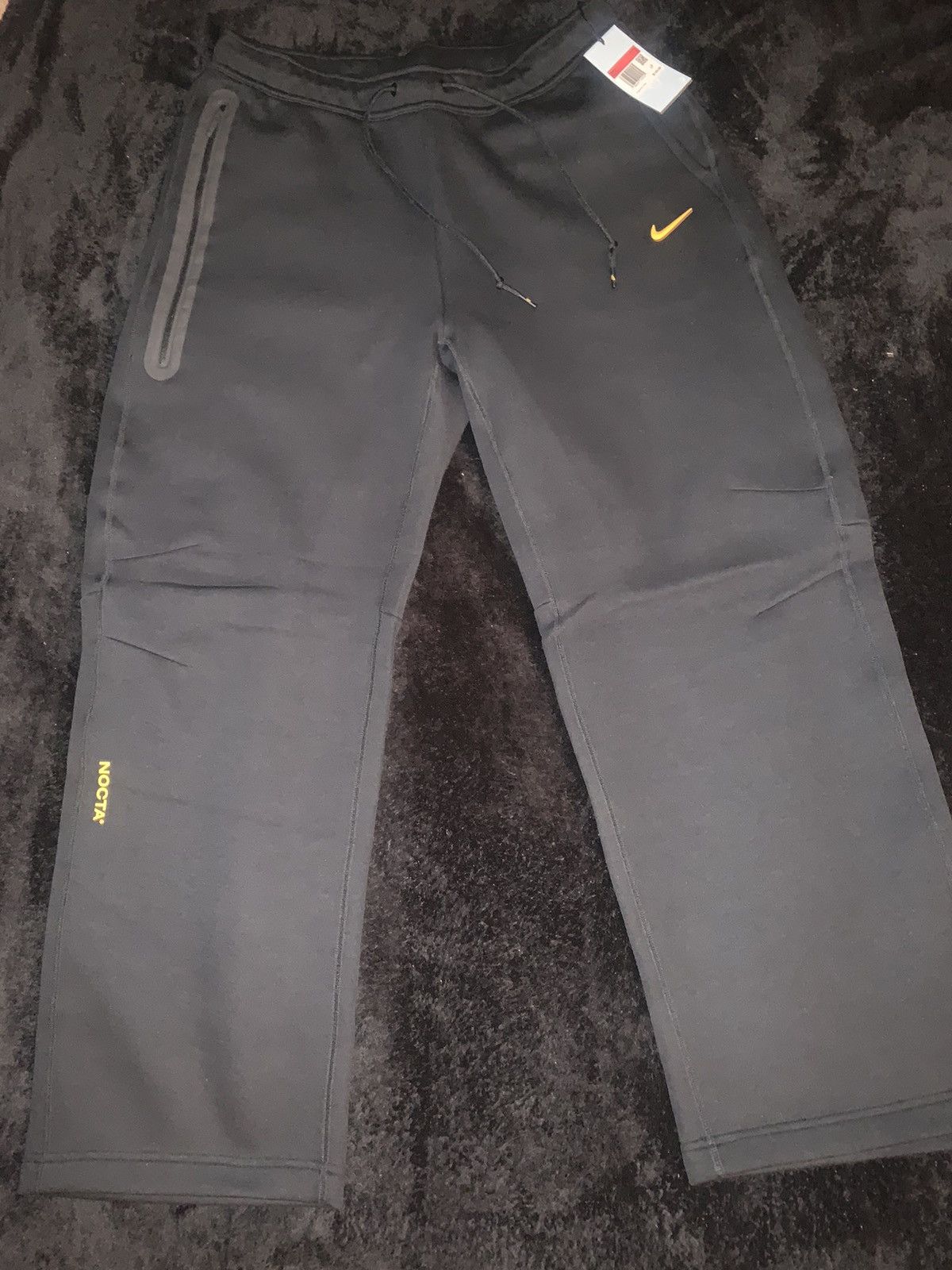 image of Drake x Nike Nocta Tech Pants in Black, Men's (Size 34)