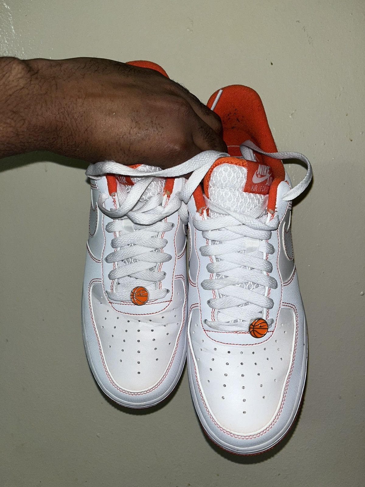 image of Nike Air Force 1 ‘07 Lv8 Emb Aka Rucker Park Shoes in White/Orange, Men's (Size 9)