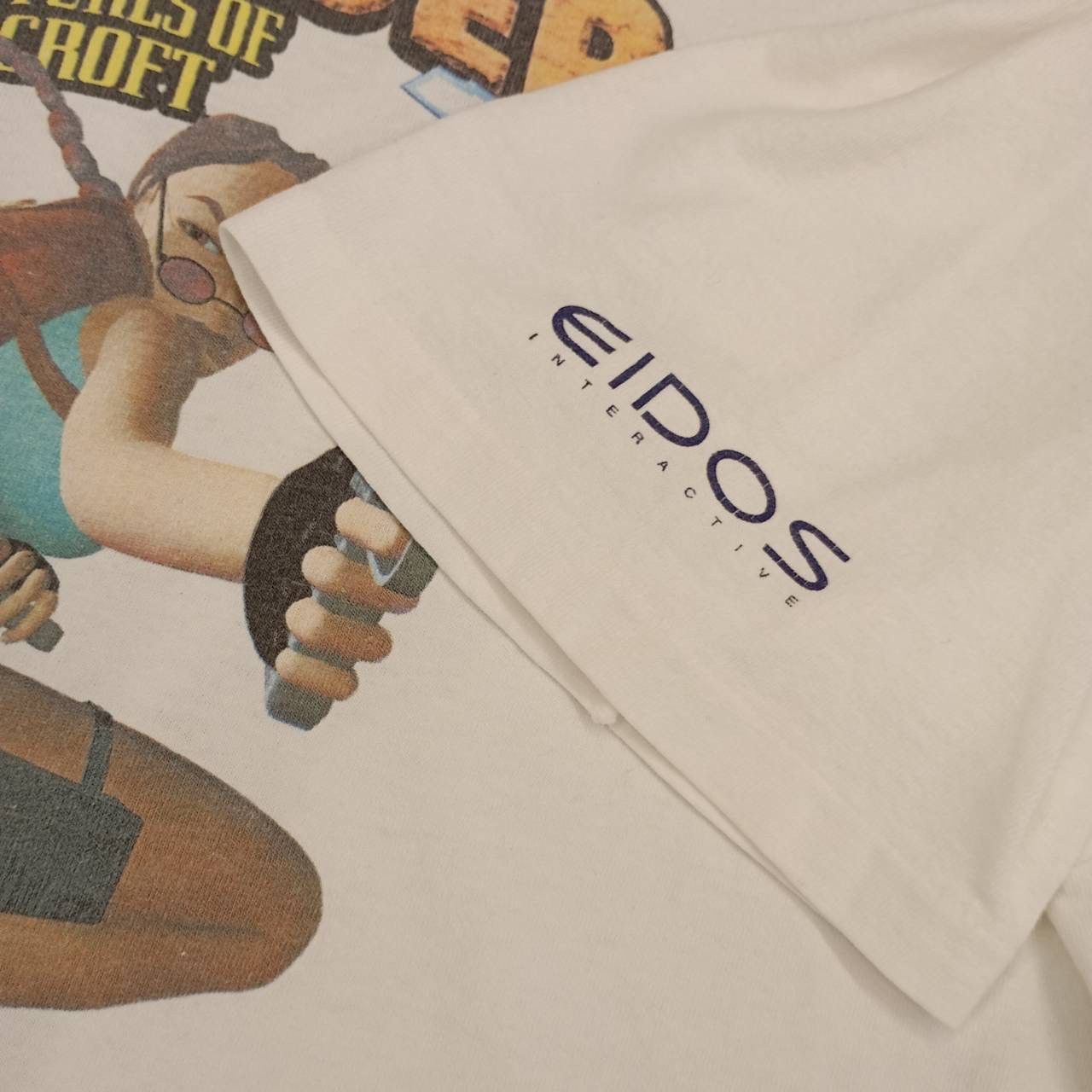Optic Gaming Vintage Tomb Raider III Lara Croft EIDOs Game Promo T Shirt Size US XL / EU 56 / 4 - 6 Thumbnail