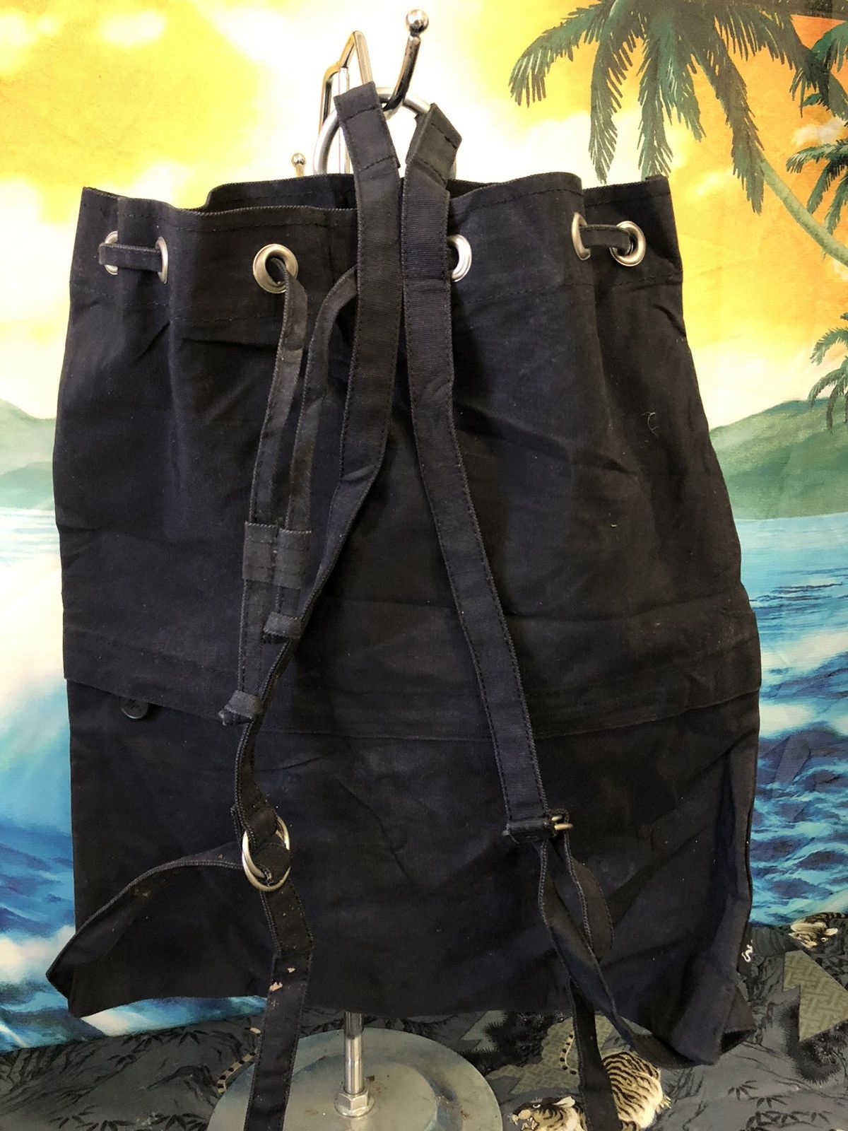 Agnes B hard canvas drawstring backpack