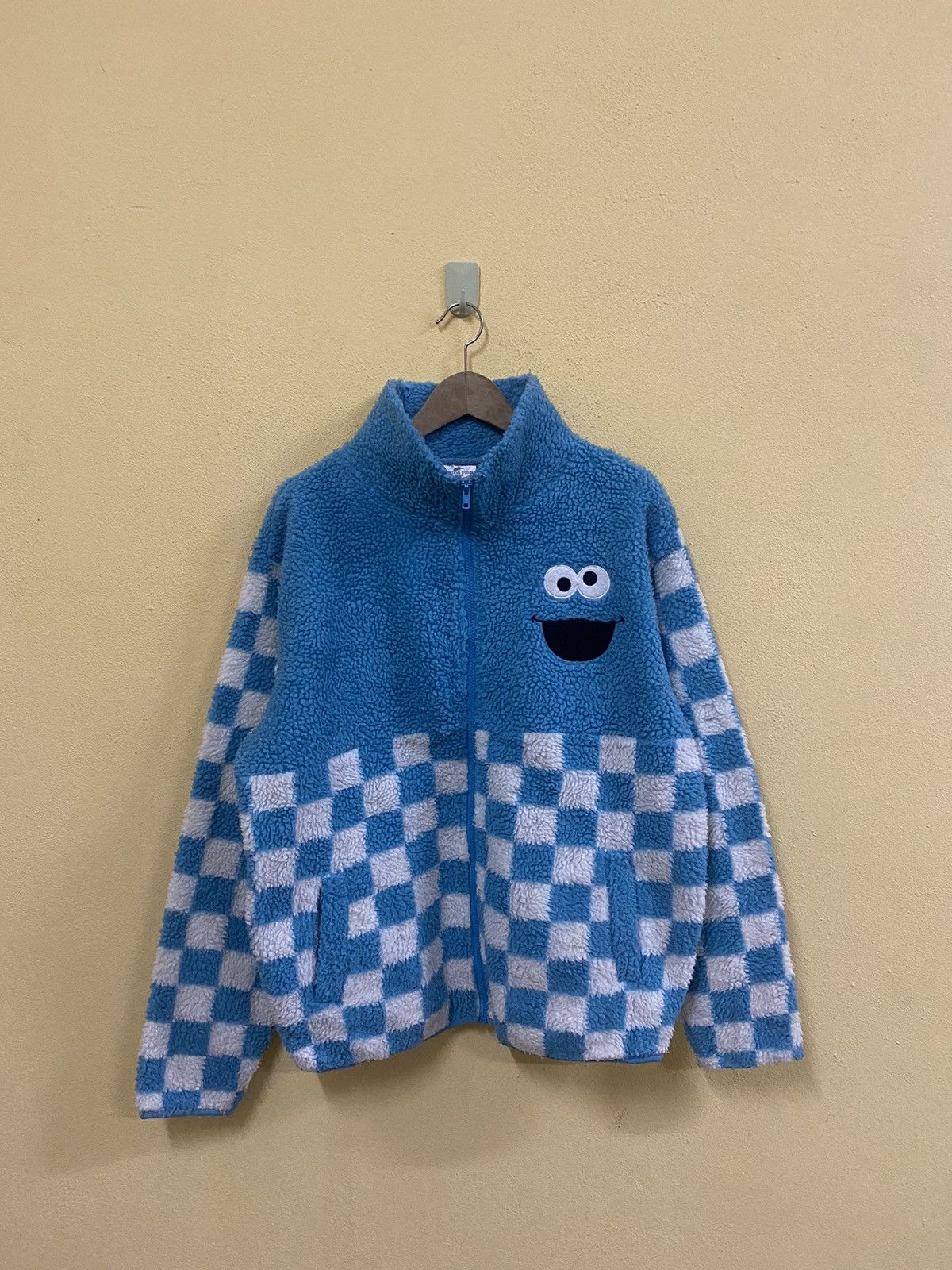 UNIVERSAL STUDIOS CHECKERBOARD FLEECE SHERPA JACKET