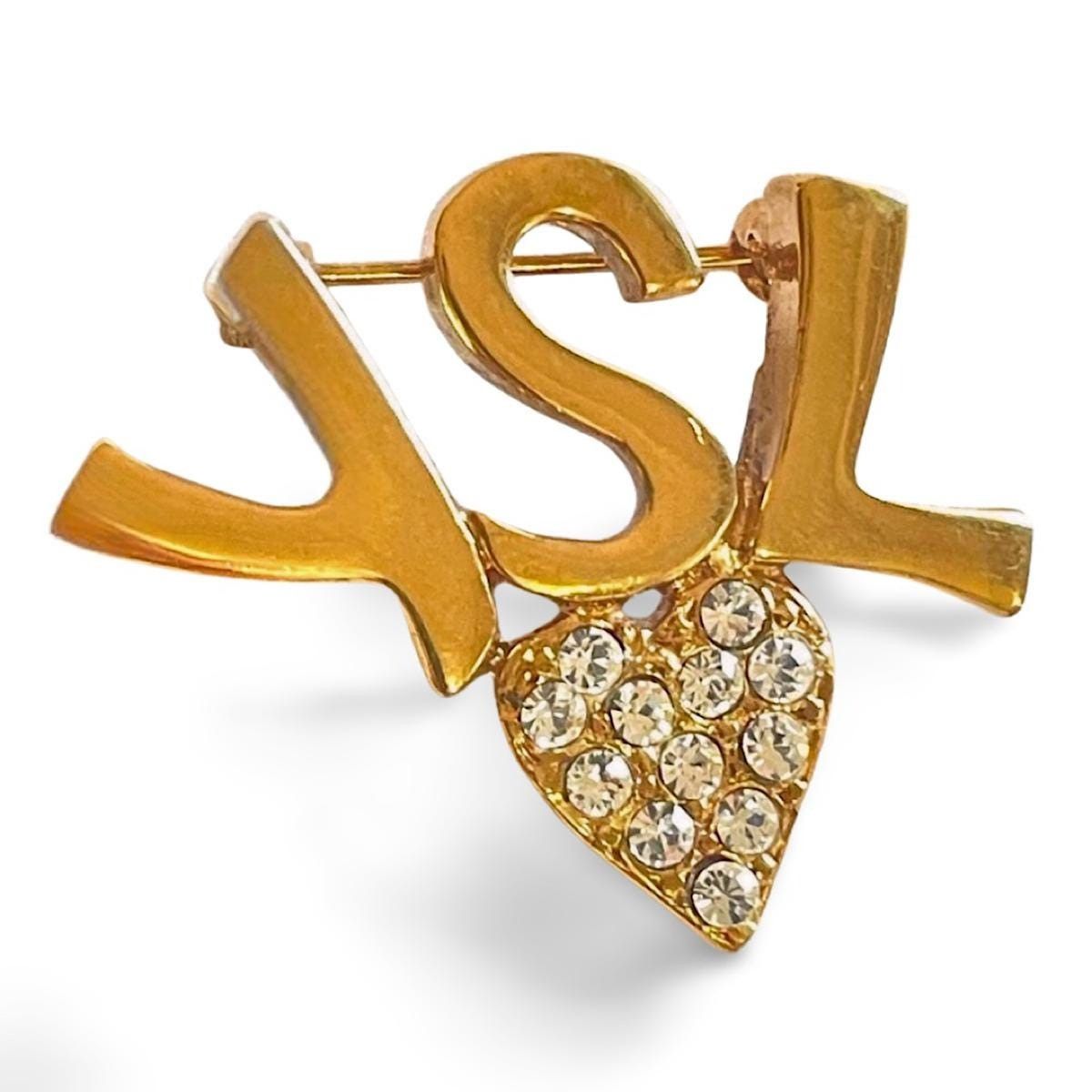 Vintage Yves Saint Laurent classic YSL logo and heart brooch