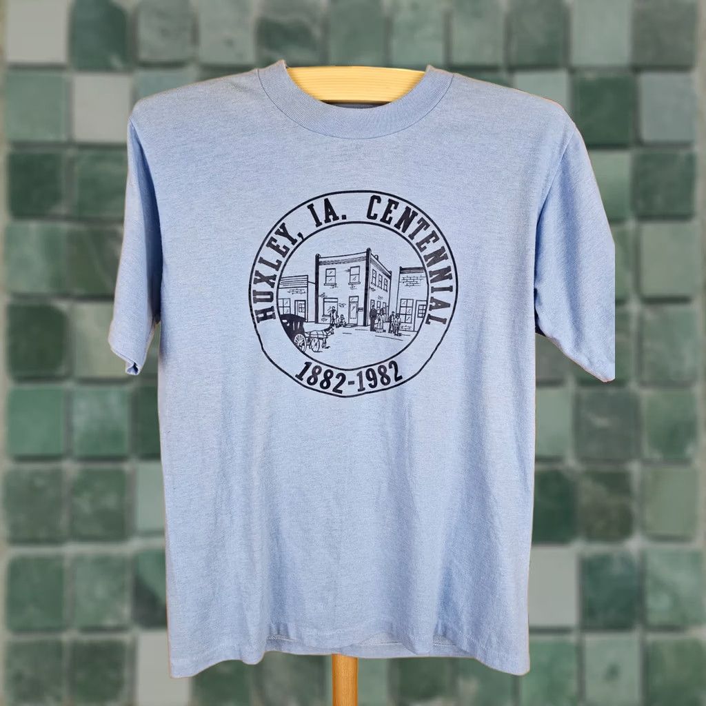 Vintage VINTAGE 82' HUXLEY IA CENTENNIAL SKY BLUE 50/50 PAPER THIN T-SHIRT SZ LARGE Shirt Mens SkyBlue 50/50 82' Huxley IA Centennial Vintage T-Shirt Size US L / EU 52-54 / 3 - 1 Thumbnail