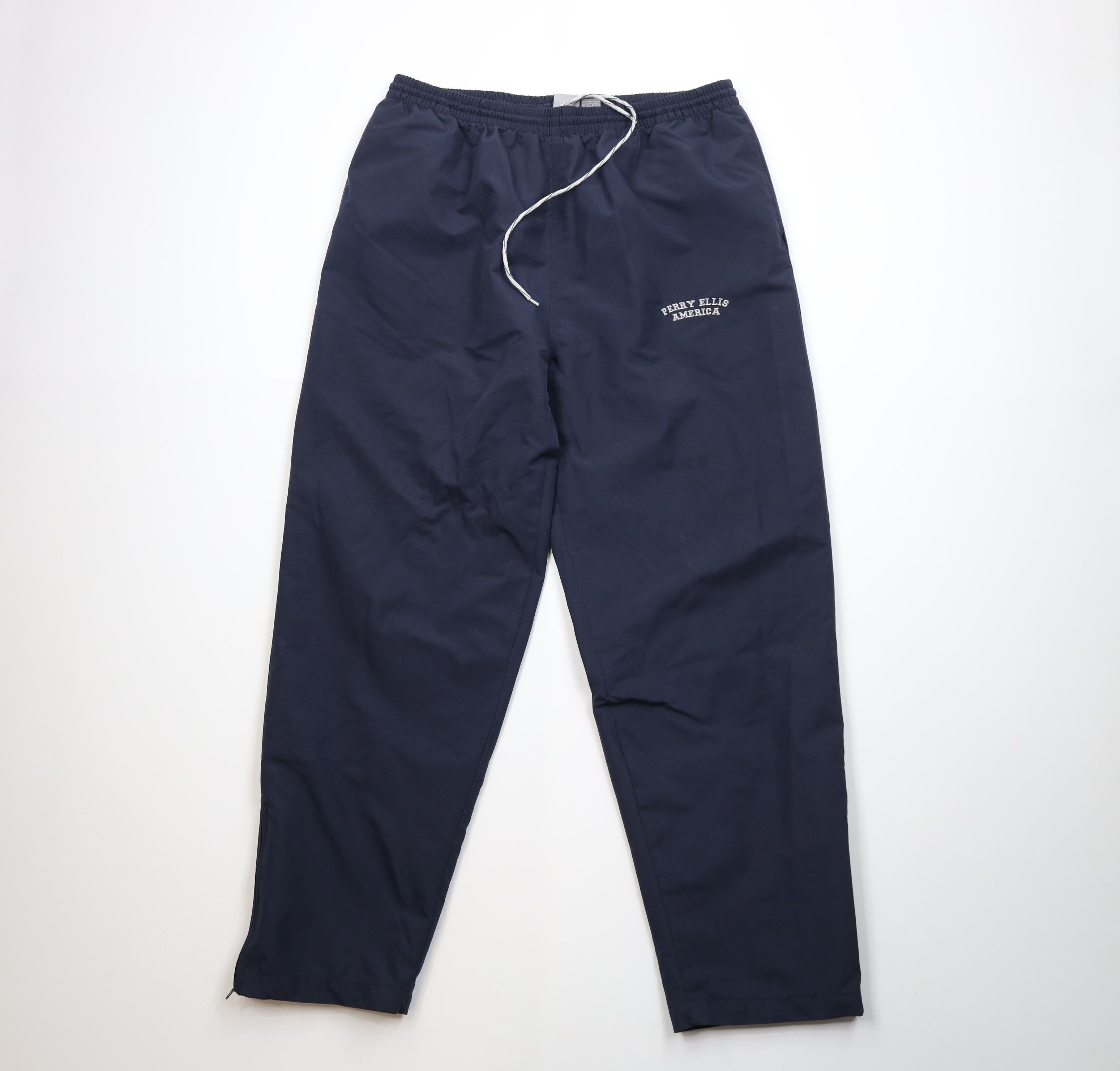 Vintage Vintage 90s Streetwear Tapered Windbreaker Pants Navy Blue Size US 38 / EU 54 - 1 Thumbnail