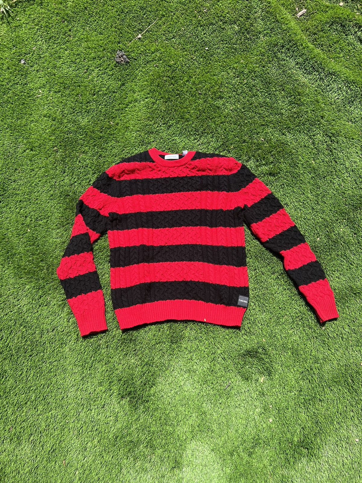 Red and black striped sweater