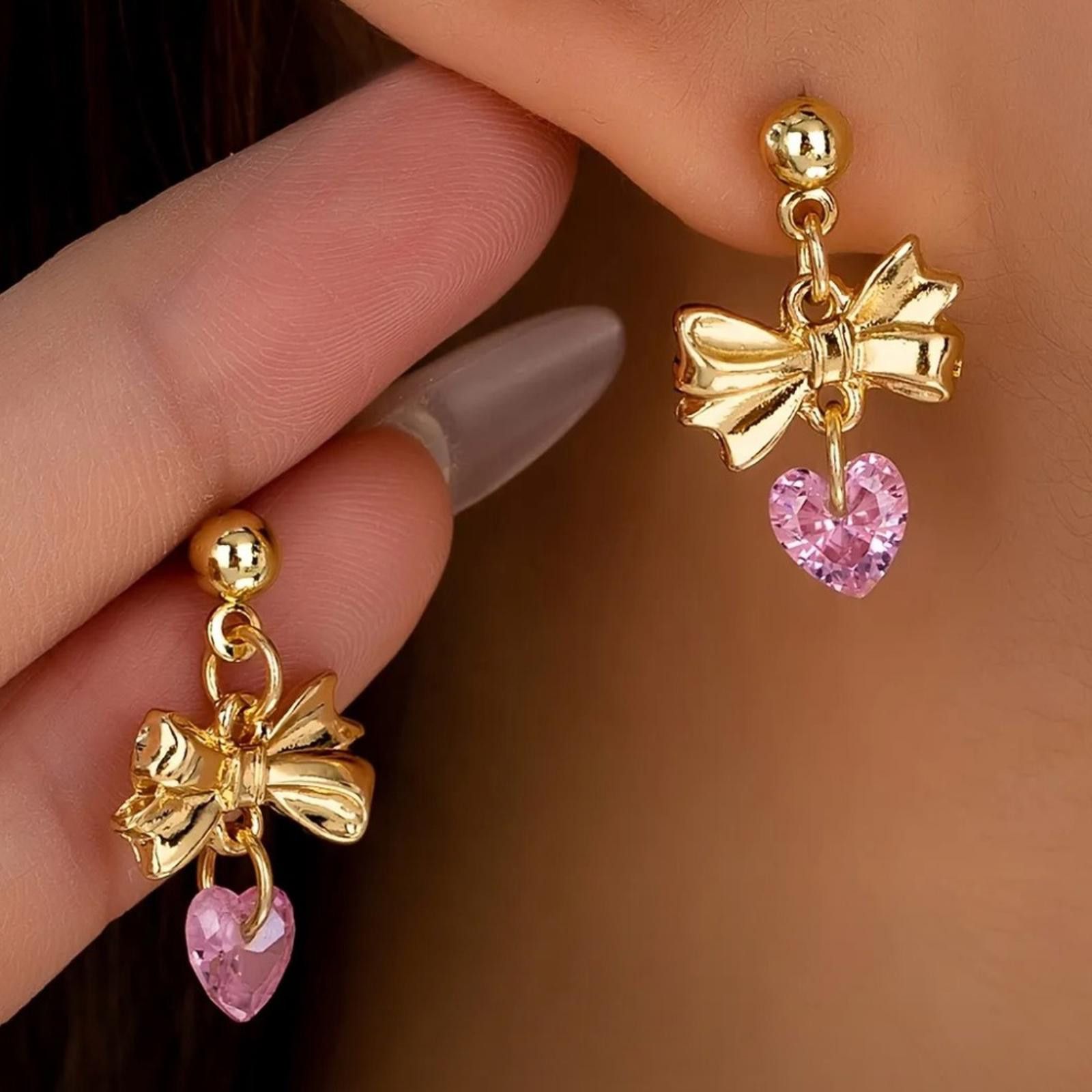Designer Gold Bow Earrings with Pink Heart Charm Size ONE SIZE - 1 Thumbnail