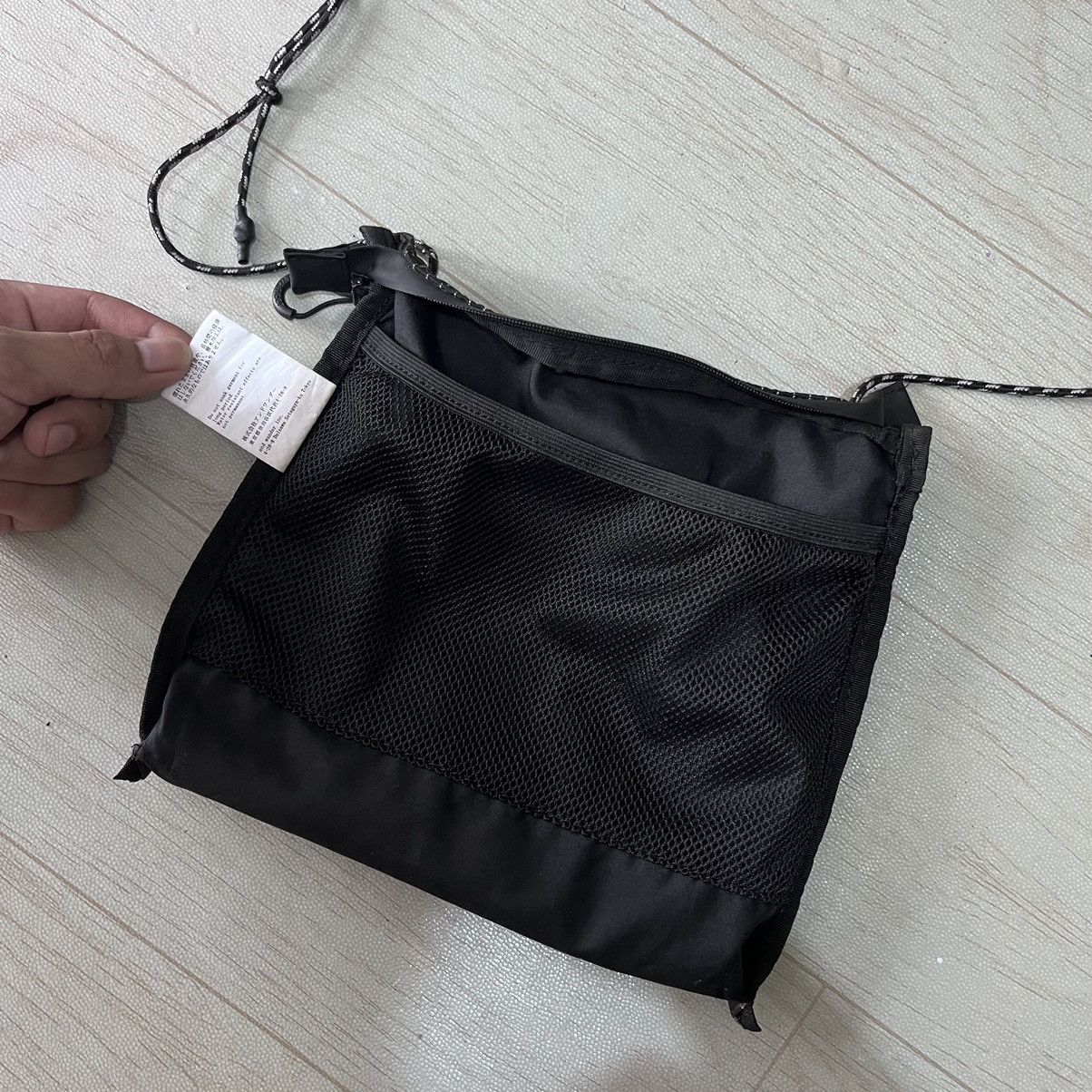 And Wander Sacoche slingbag reflective