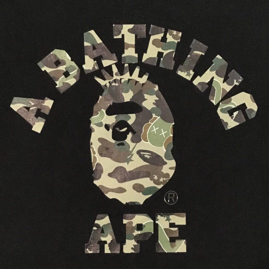 Bape × Kaws BAPE × KAWS 1st camo green bendy NYC college logo T-shirt Size US M / EU 48-50 / 2 - 3 Thumbnail