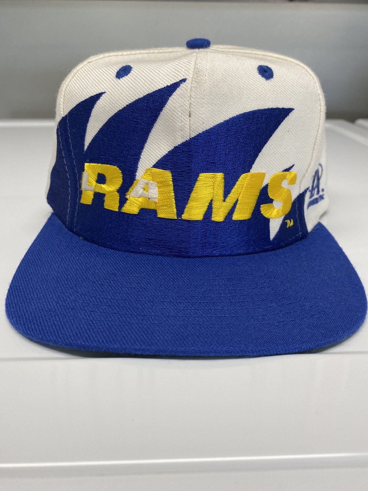 image of L.a. Rams Vintage 90's Shark Tooth Logo Athletic Snapback in Blue, Men's