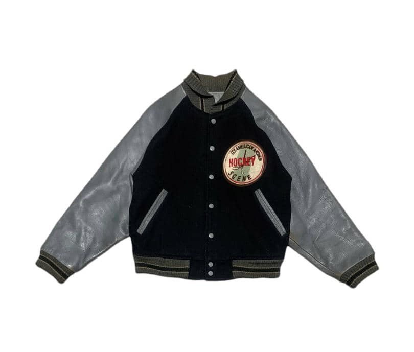 1980s Vintage Leather and Wool selling Varsity Jacket.