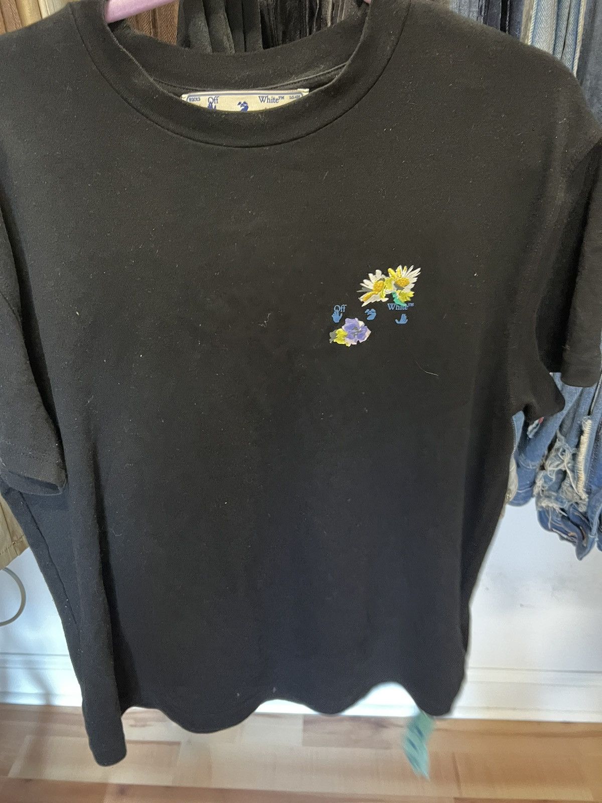 Off white tee flower logo