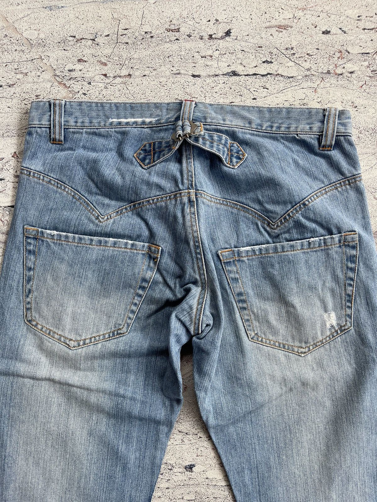 Sunao kuwahara distressed jeans by issey miyake
