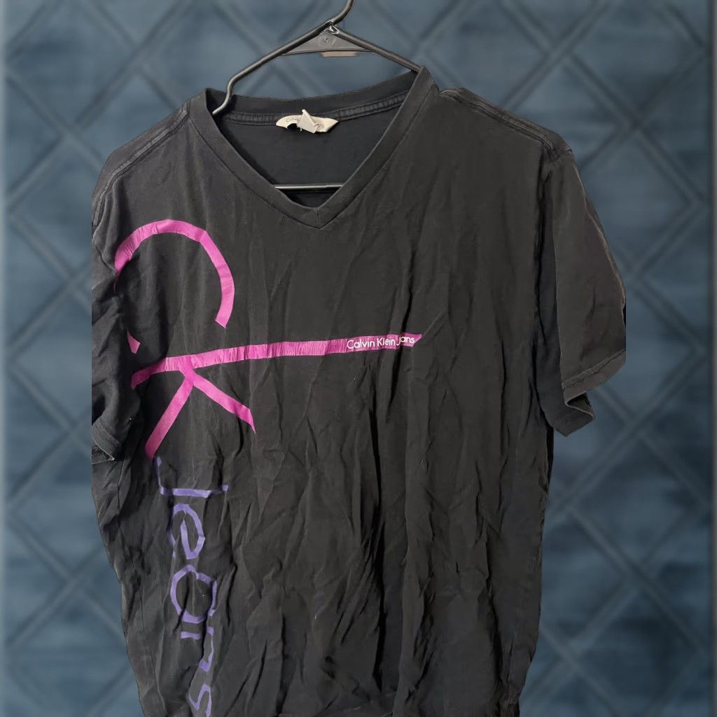 Vintage Calvin Klein Jeans Men Black Graphic Tee Short Sleeve Tee Large Logo Distressed Size 36" / US 14 / IT 50 - 1 Thumbnail