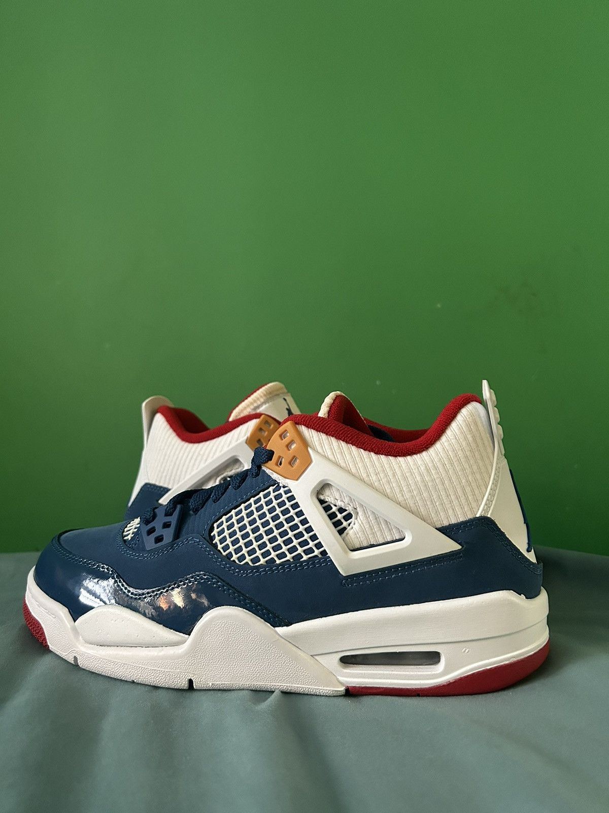 image of Nike Air Jordan 4 Messy Room 2022 Shoes in Blue, Men's (Size 7)