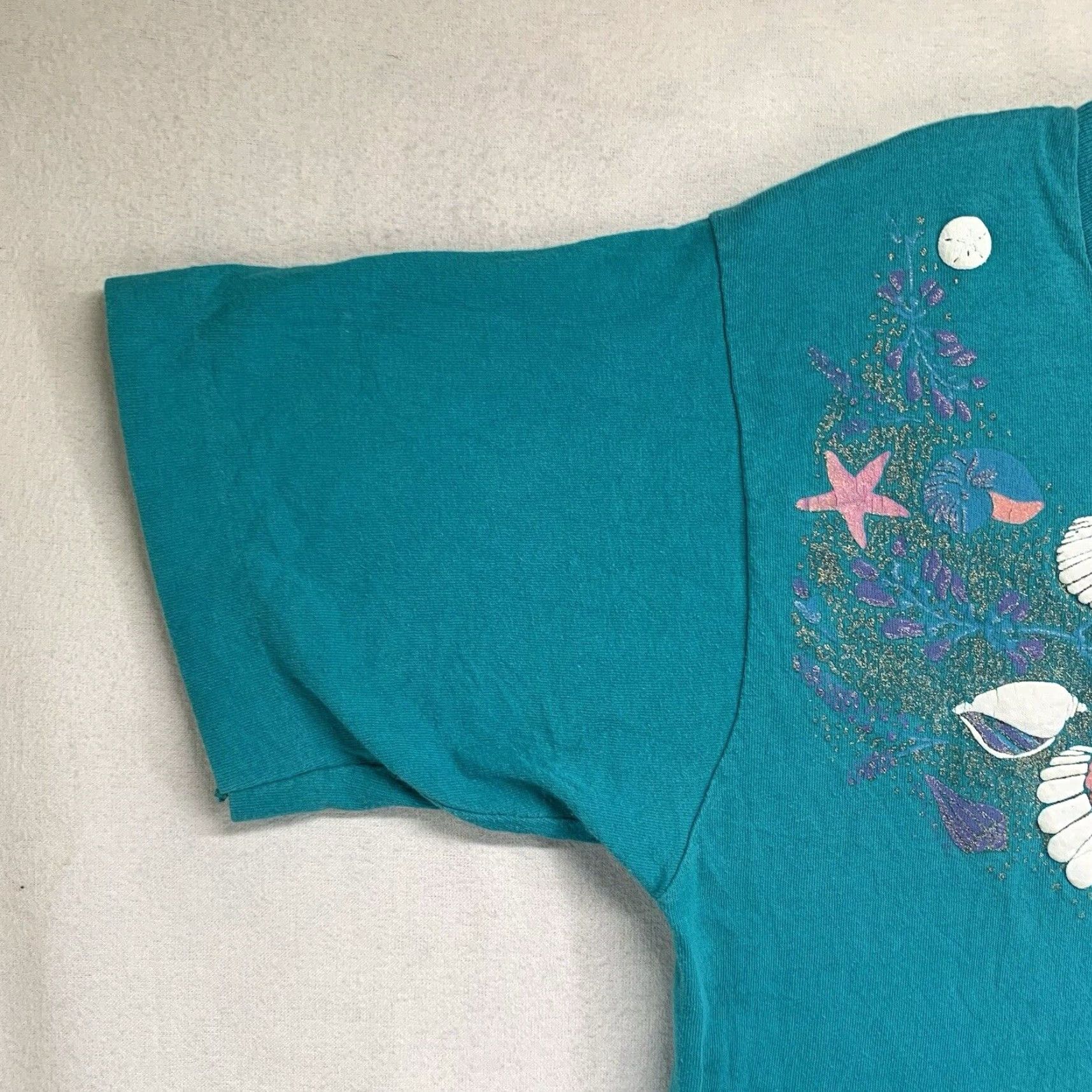 Fruit Of The Loom VINTAGE Fruit of the Loom T-Shirt Unisex Adults Medium Blue Beach 80s 90s Seal Shell Glitter Artwork Size US M / EU 48-50 / 2 - 7 Thumbnail