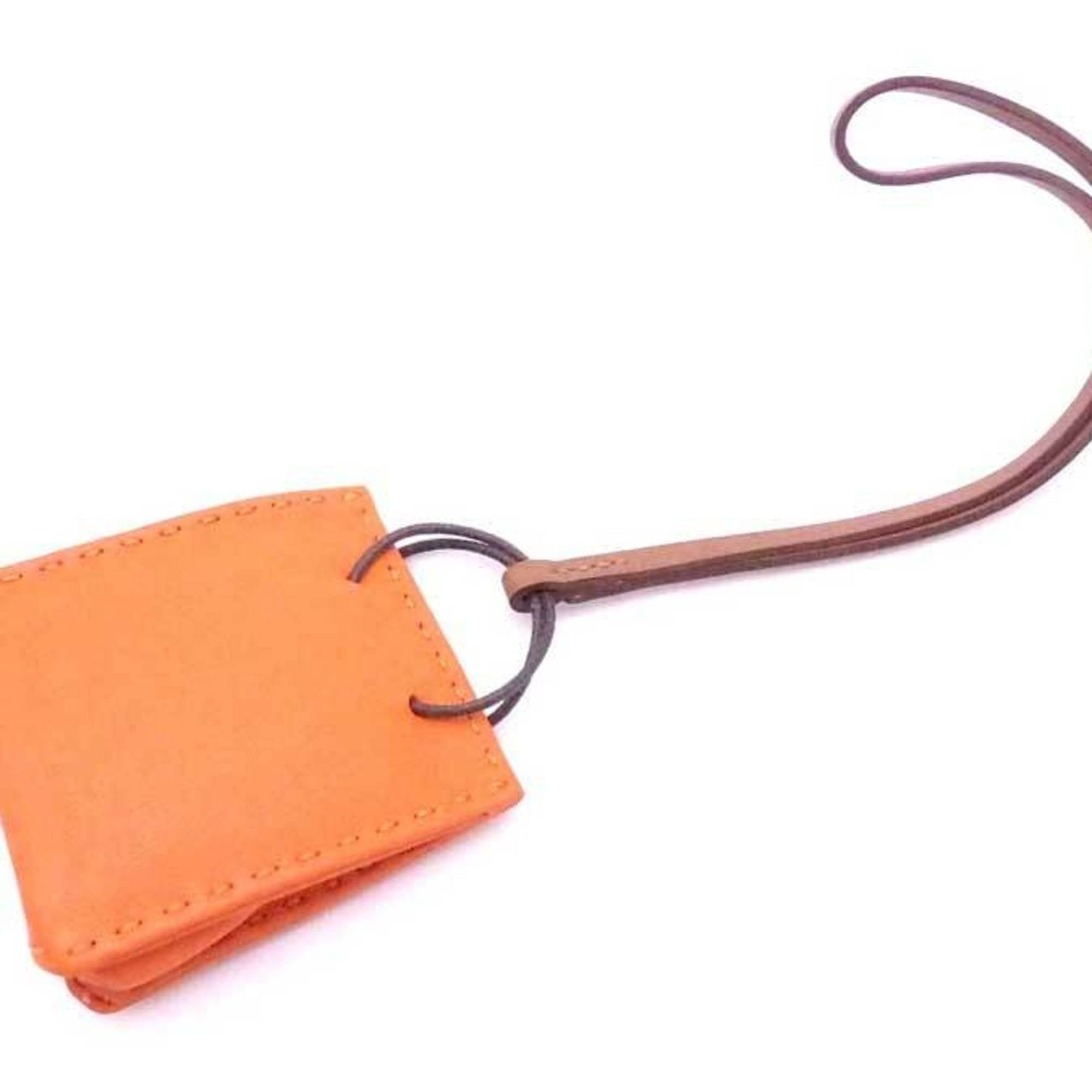 image of Hermes Charm Sac Orange Leather X Brown Unisex in Black, Women's