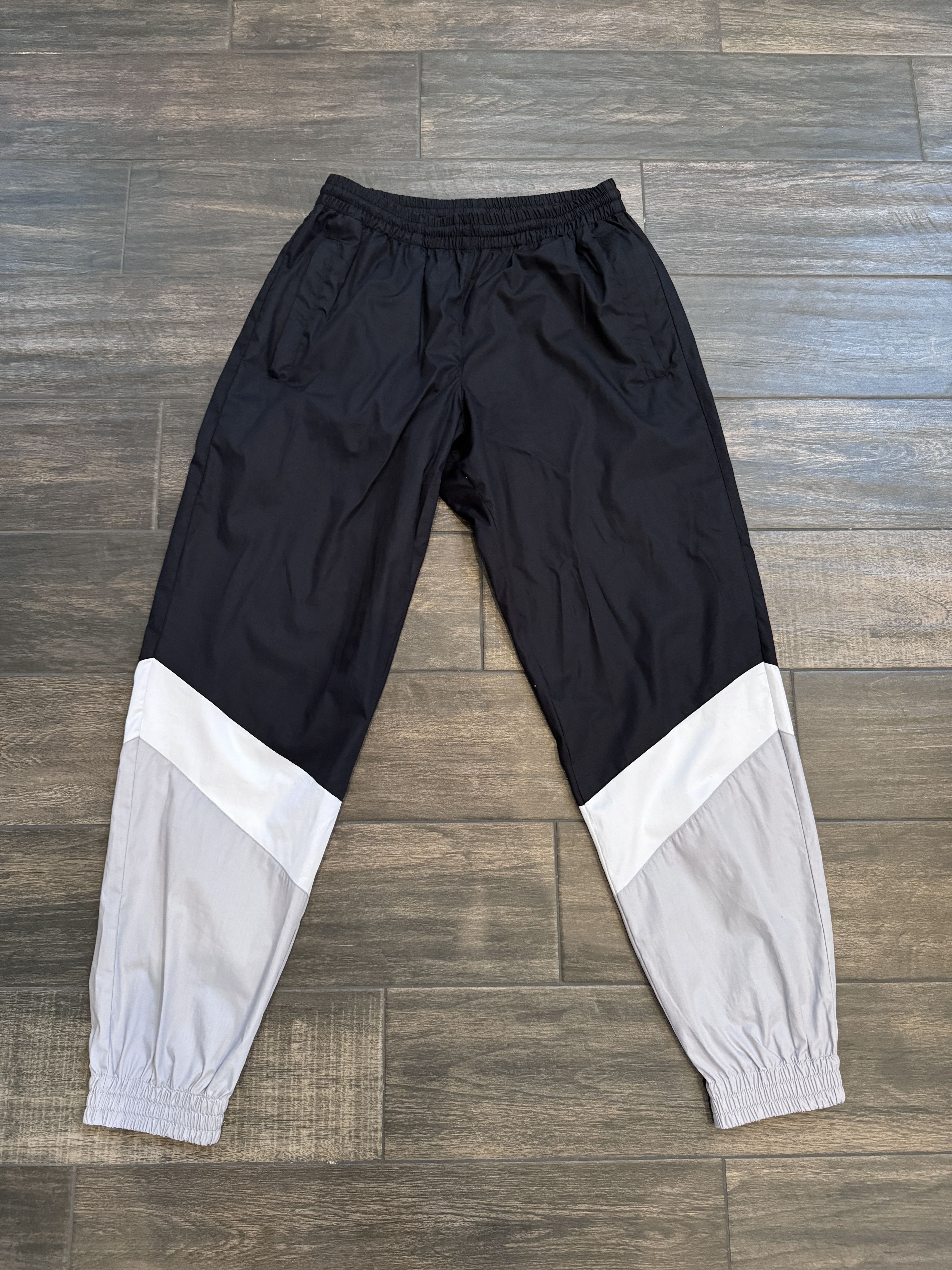 image of Vetements Paneled Track Pants Black White Gray, Men's (Size 30)