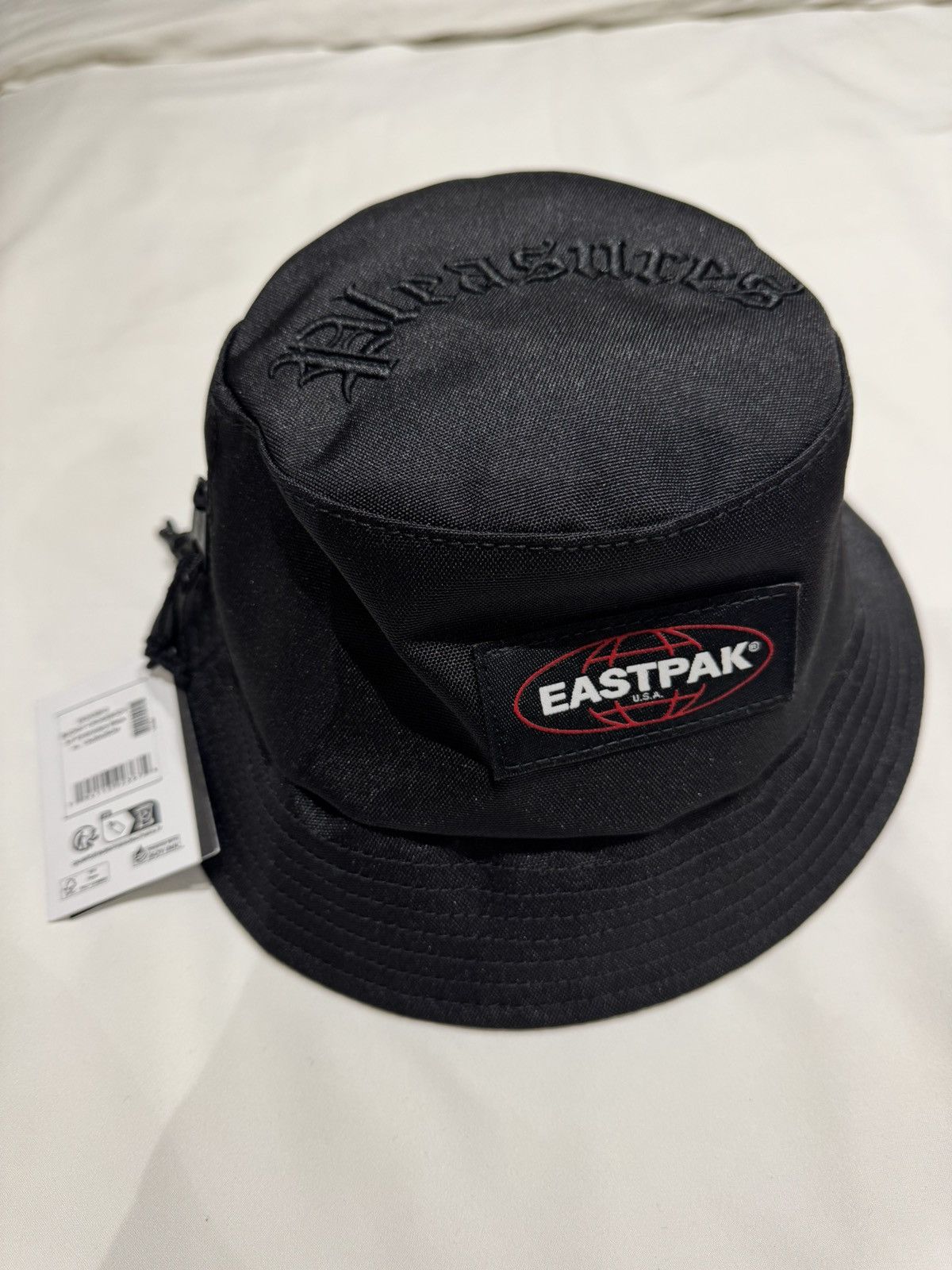 Eastpak Eastpak X Pleasures Bucket Crossbody Hat Size ONE SIZE - 1 Thumbnail
