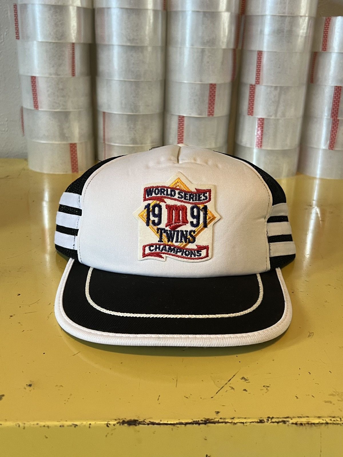 image of Vintage 1991 World Series Minnesota Twins Three Stripe Trucker Hat in Black, Men's