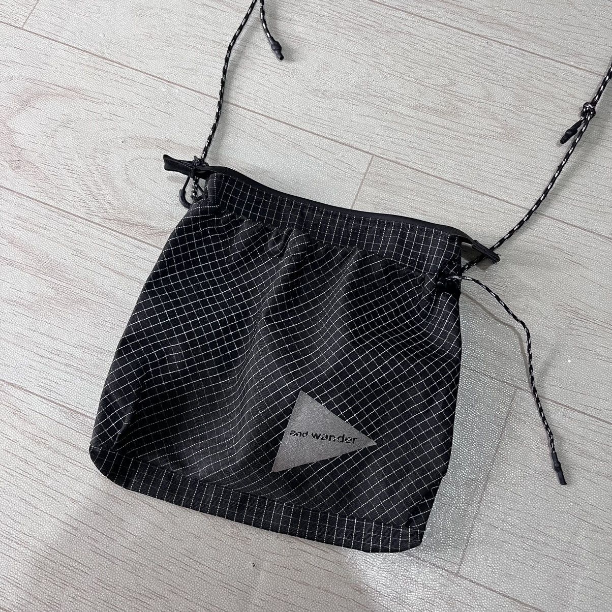 And Wander Sacoche slingbag reflective