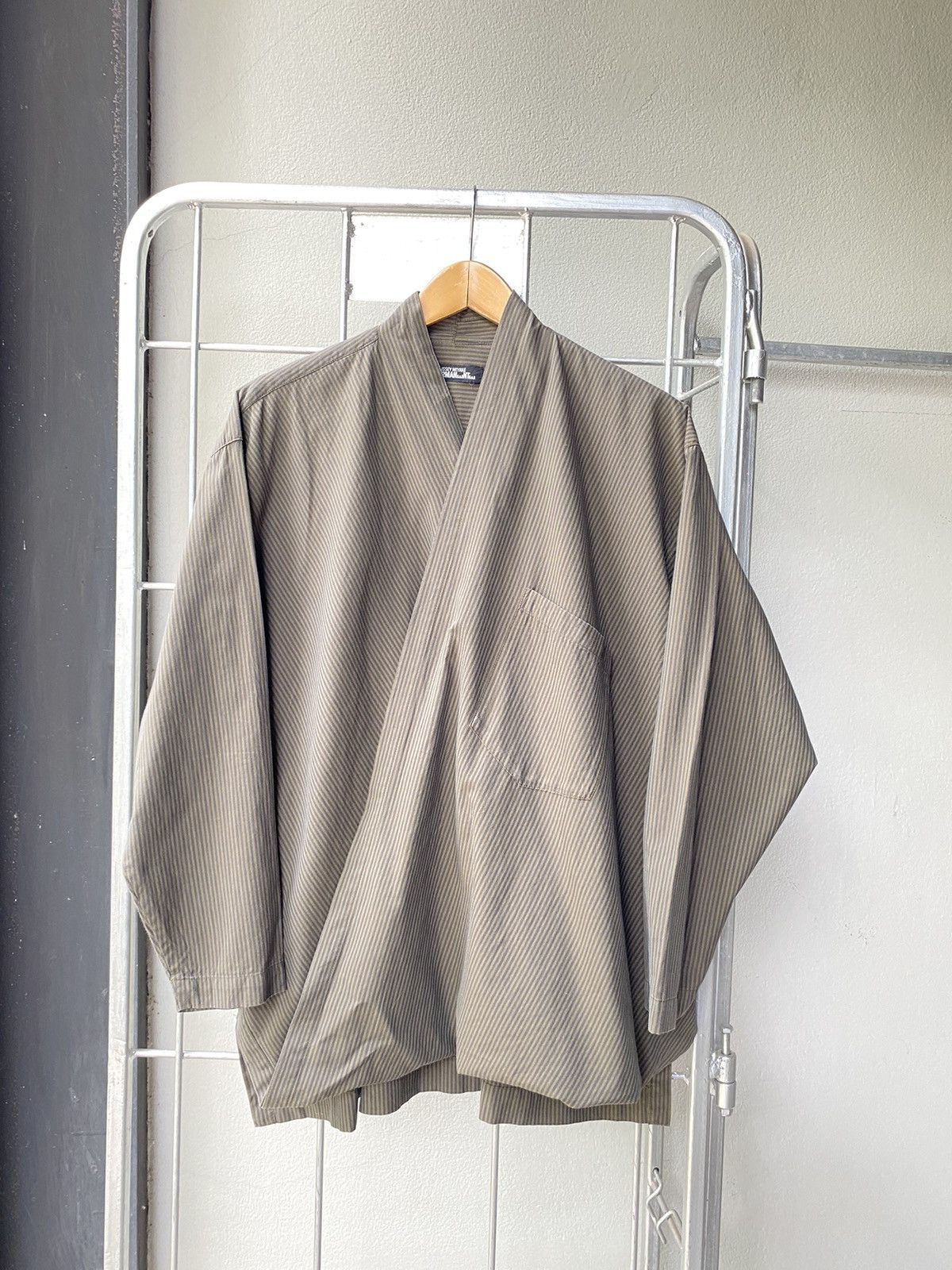 Issey Miyake Permanent wrapped strips shirt.