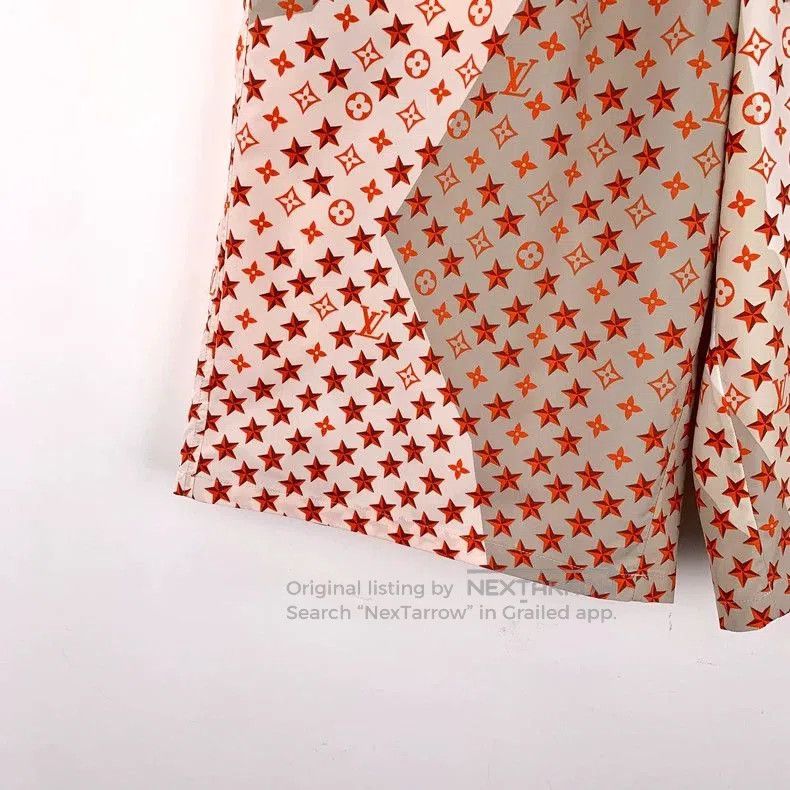 Louis Vuitton Pink Logo Star Print Shorts.