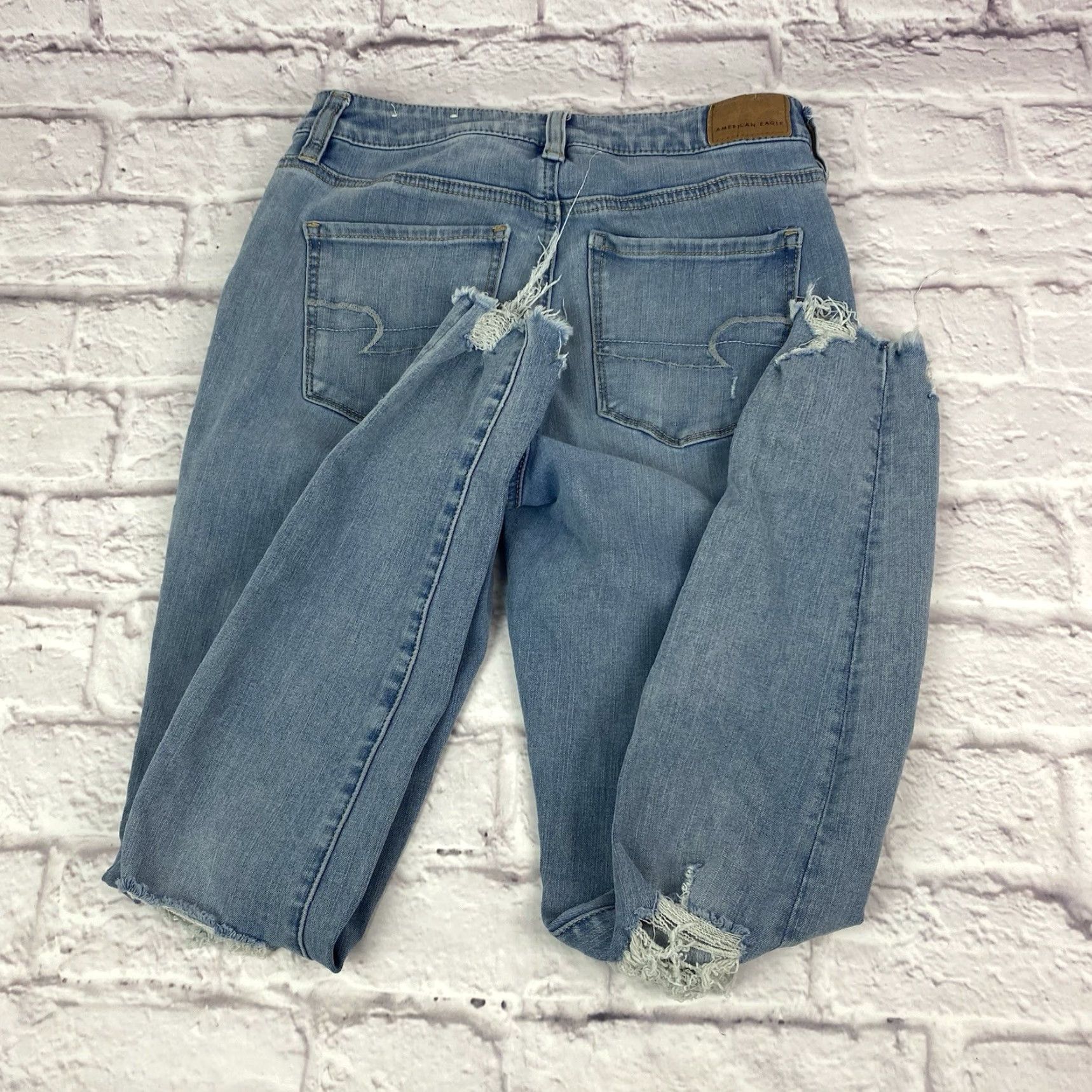 American Eagle Outfitters American Eagle Jeans Junior Teen Size 4 Jegging Light Wash Distressed Frayed Hem Size 27" / US 4 / IT 40 - 4 Thumbnail