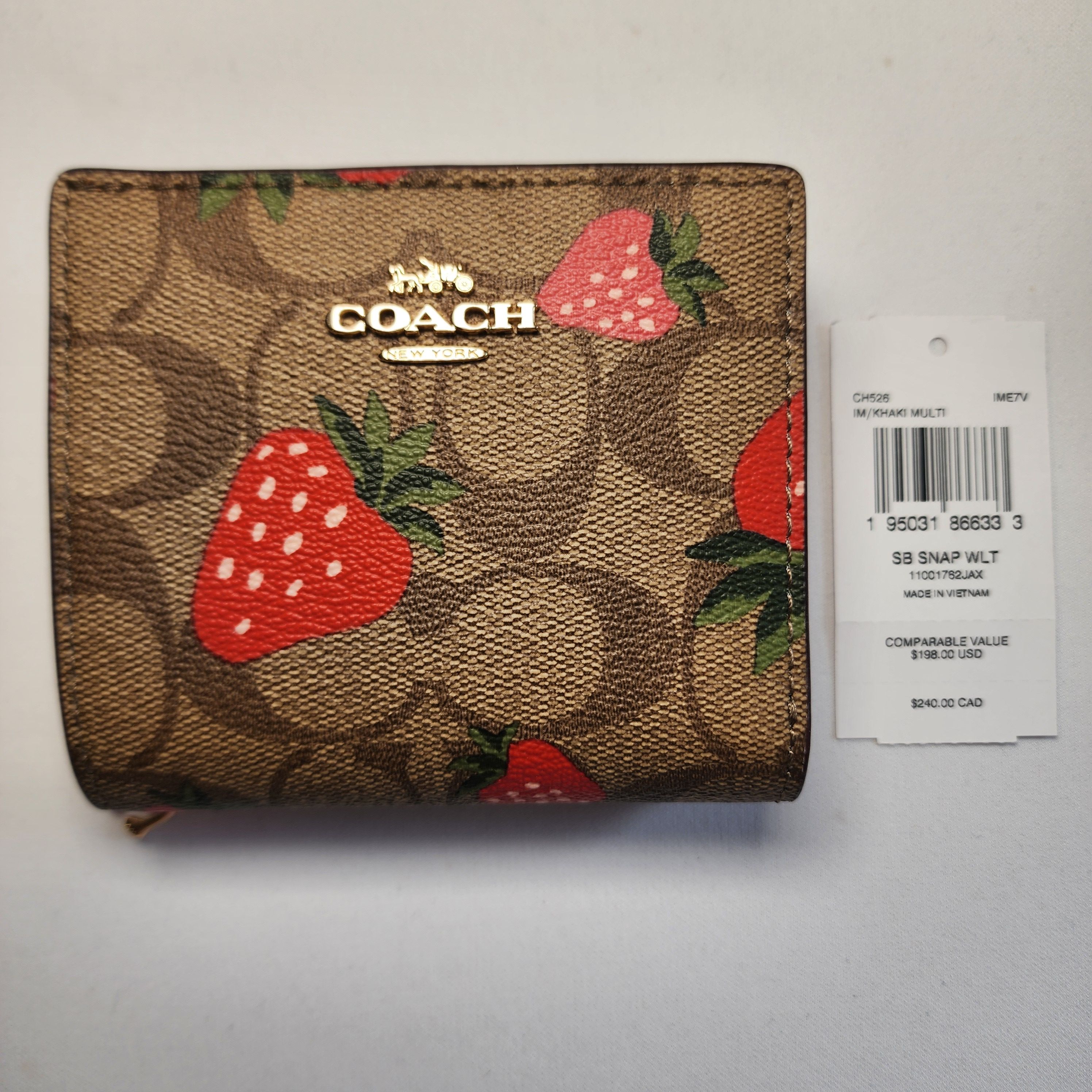 Coach good card case wallet and strawberry keychain charm