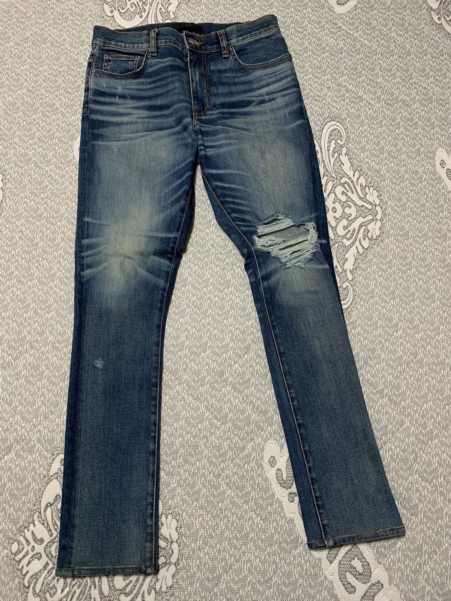 AMIRI Distressed Washed Jeans