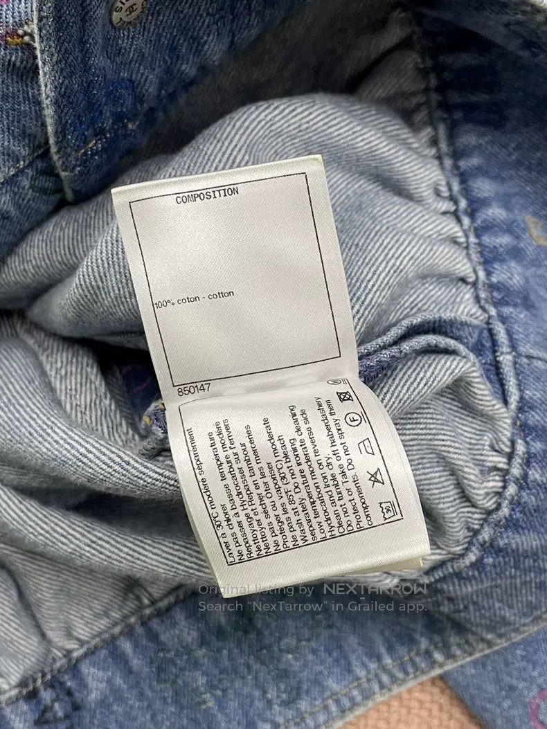 Chanel Logo denim jacket with graffiti