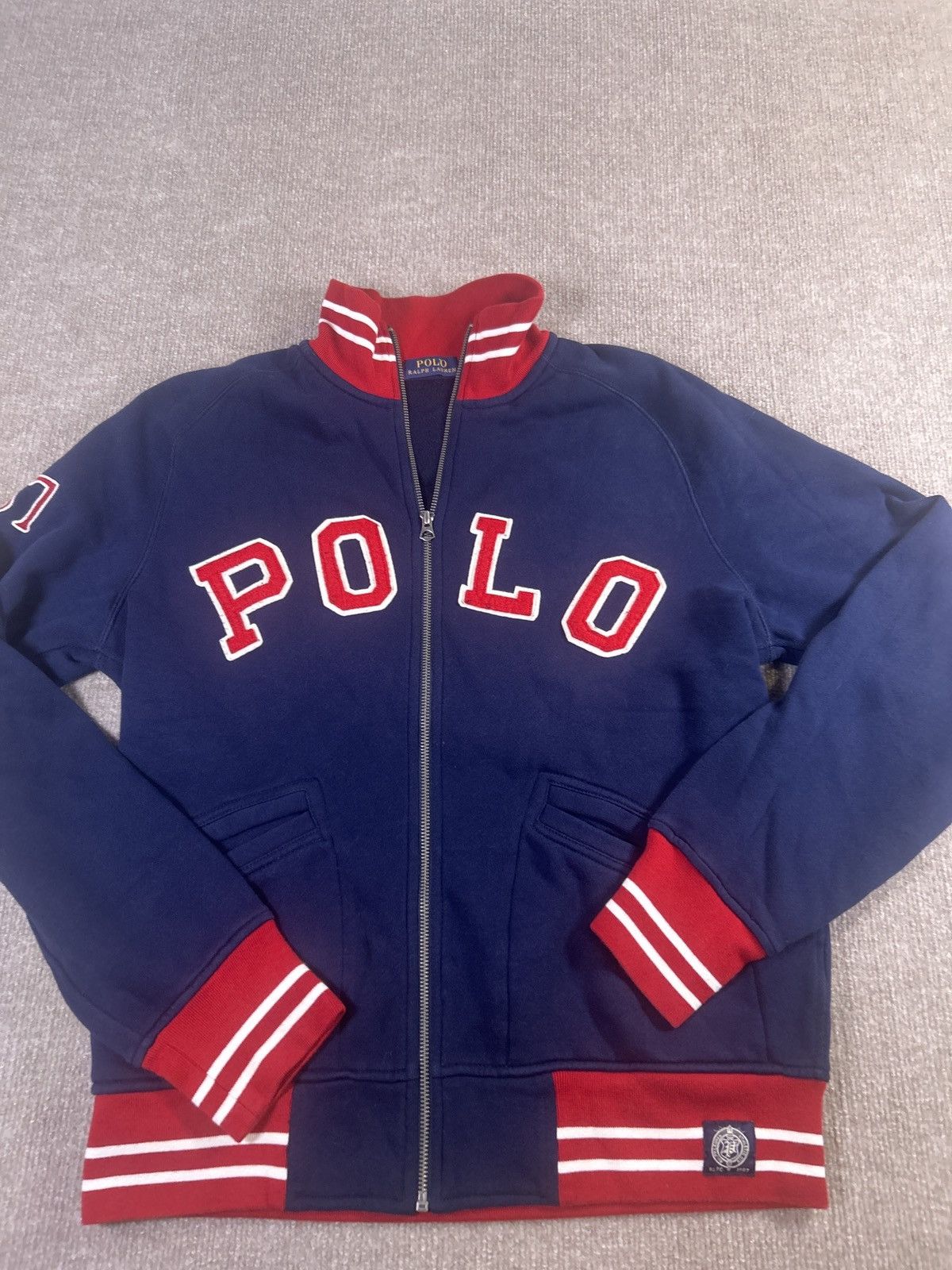 Polo Ralph Lauren Polo Ralph Lauren varsity zip jacket. Navy w/ bold POLO 0074 Size US M / EU 48-50 / 2 - 1 Thumbnail