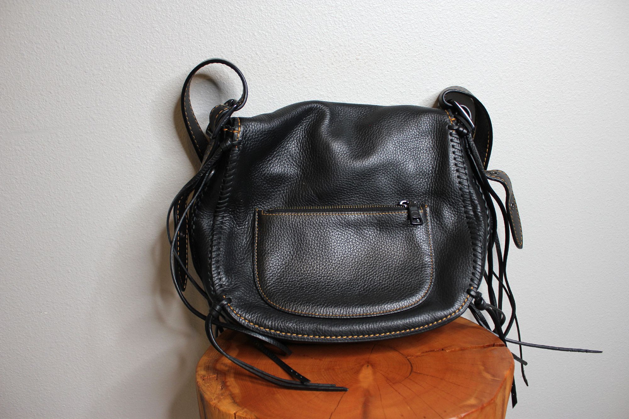 image of Coach Whiplash Saddle Bag In Leather in Black, Women's