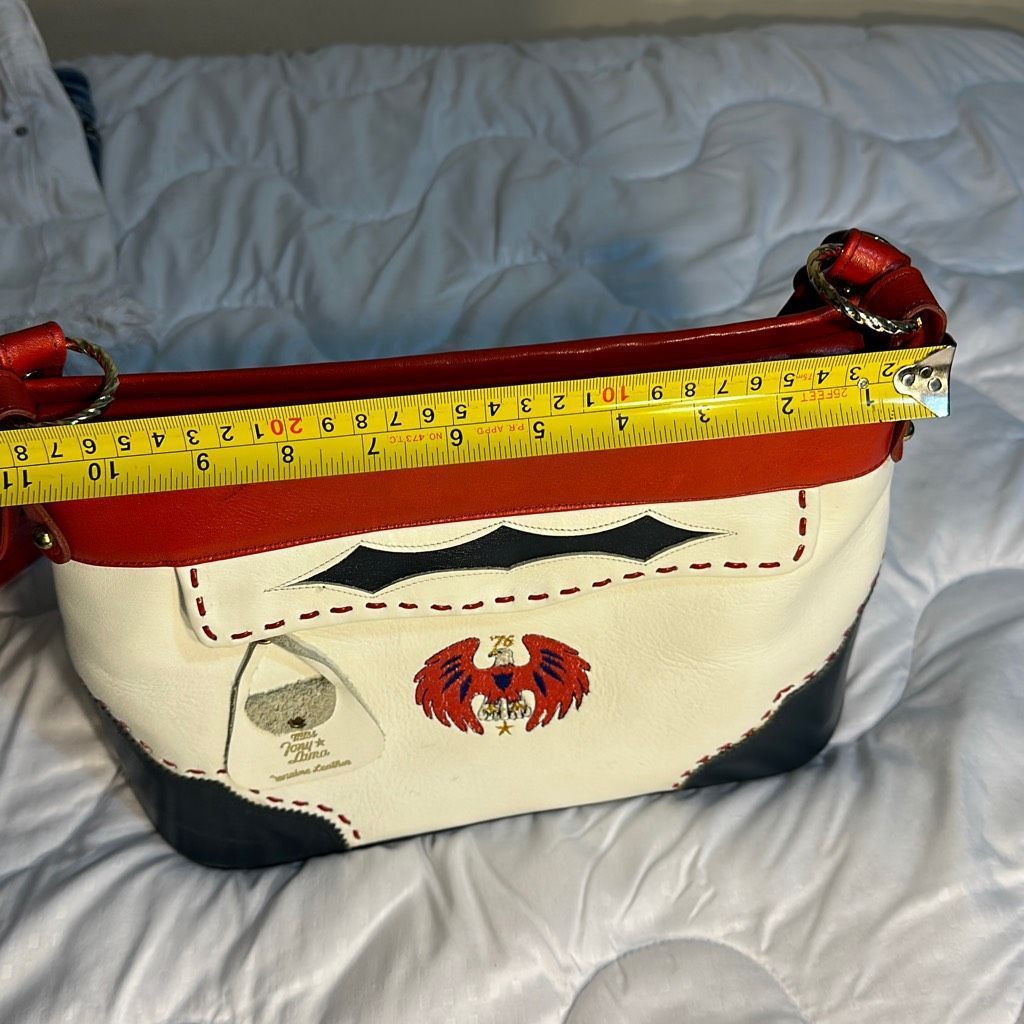 Miss Tony Lama Vintage Leather purse with strap.