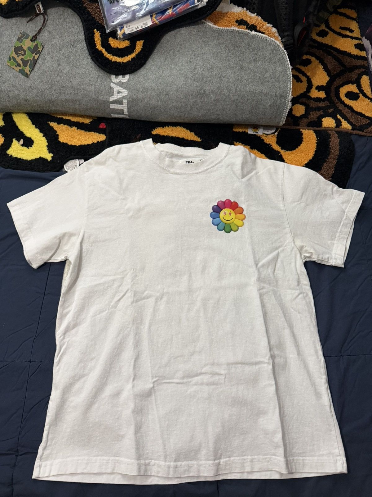 Takashi Murakami Takashi Murakami-J Balvin Tee. White used worn once. Colores Size US L / EU 52-54 / 3 - 2 Thumbnail