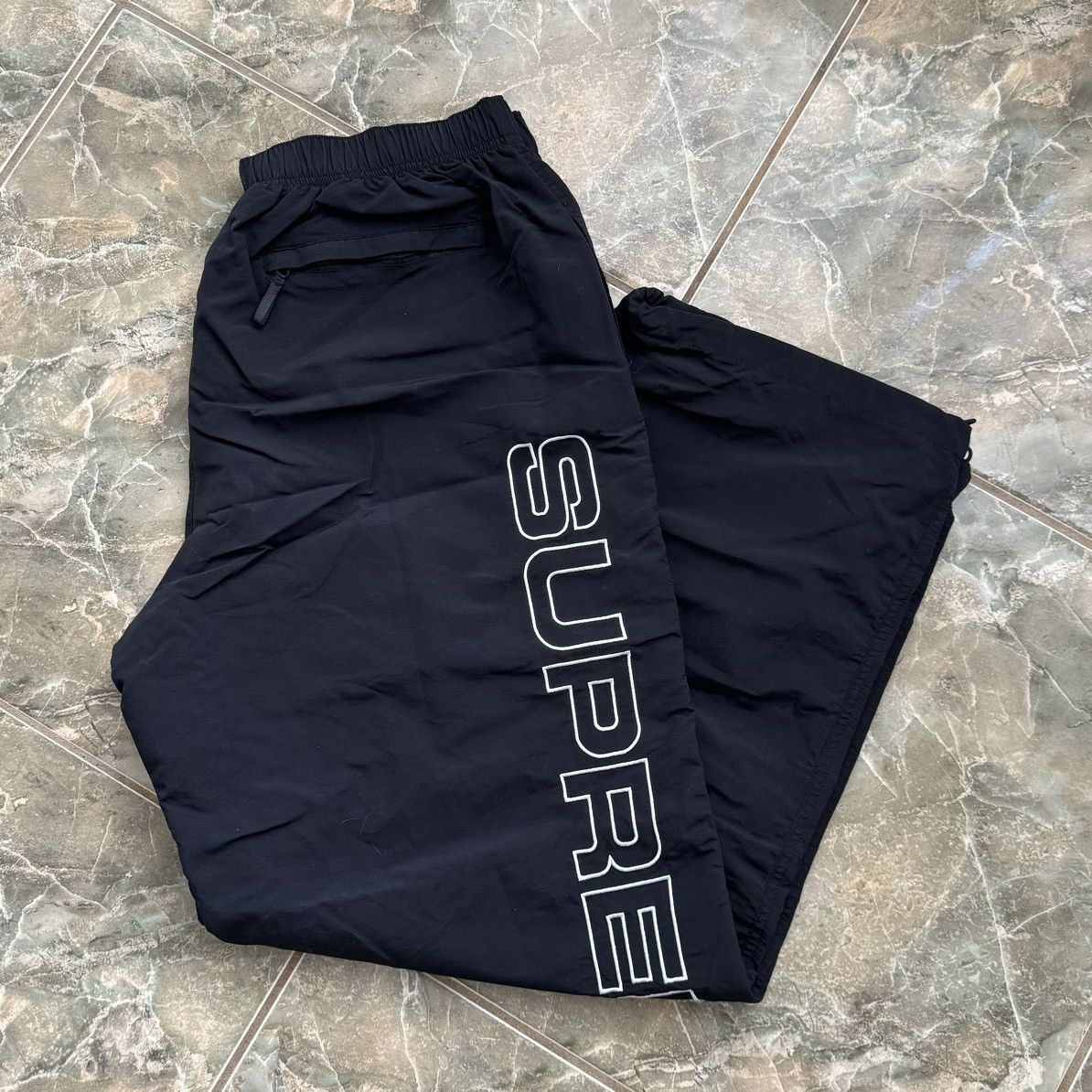 Supreme Supreme spellout track pants | Grailed