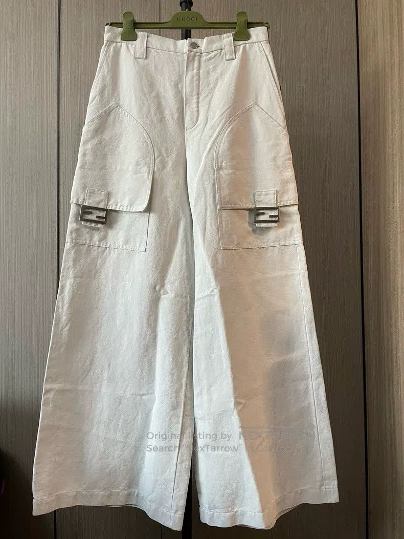 Fendi Fendi The woman is wearing beige wide-leg pants. Size 27" / US 4 / IT 40 - 1 Thumbnail