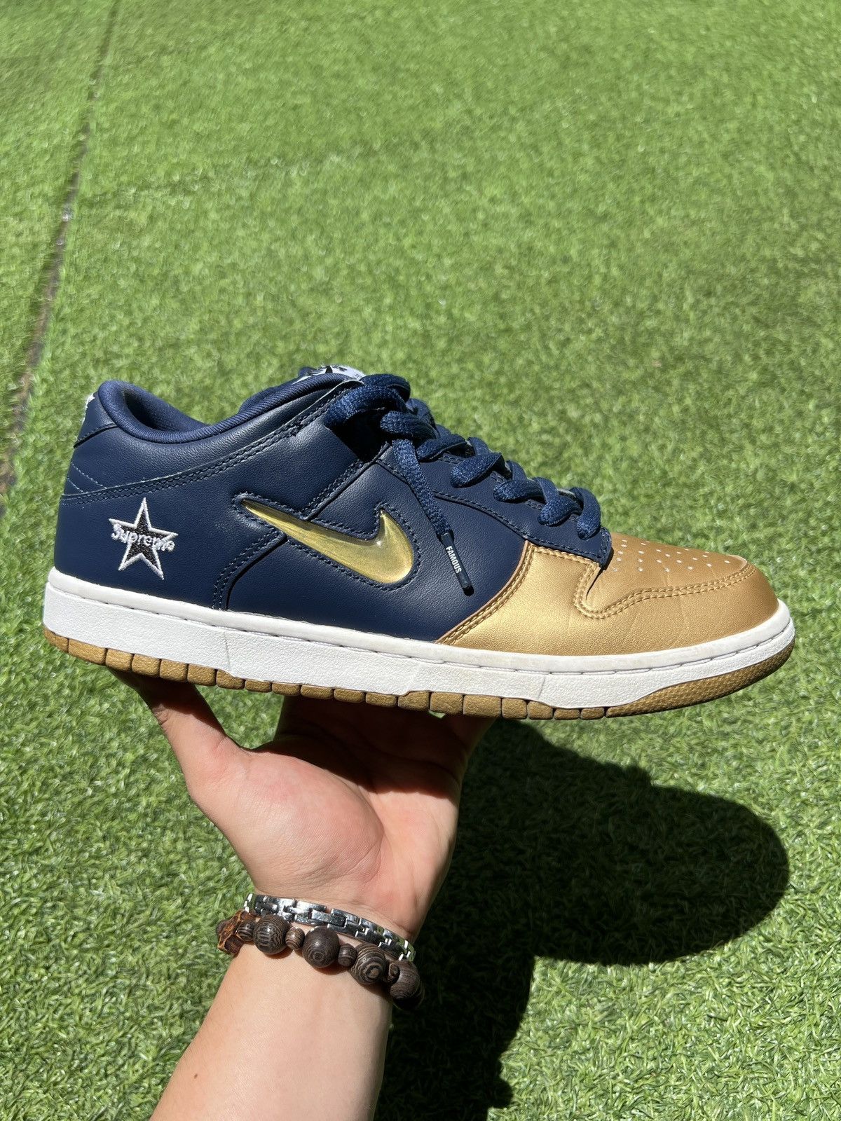 Nike × Supreme Supreme x Nike Sb Dunk Low Metallic Gold/Navy CK3480-700 Size US 8 / EU 41 - 1 Thumbnail