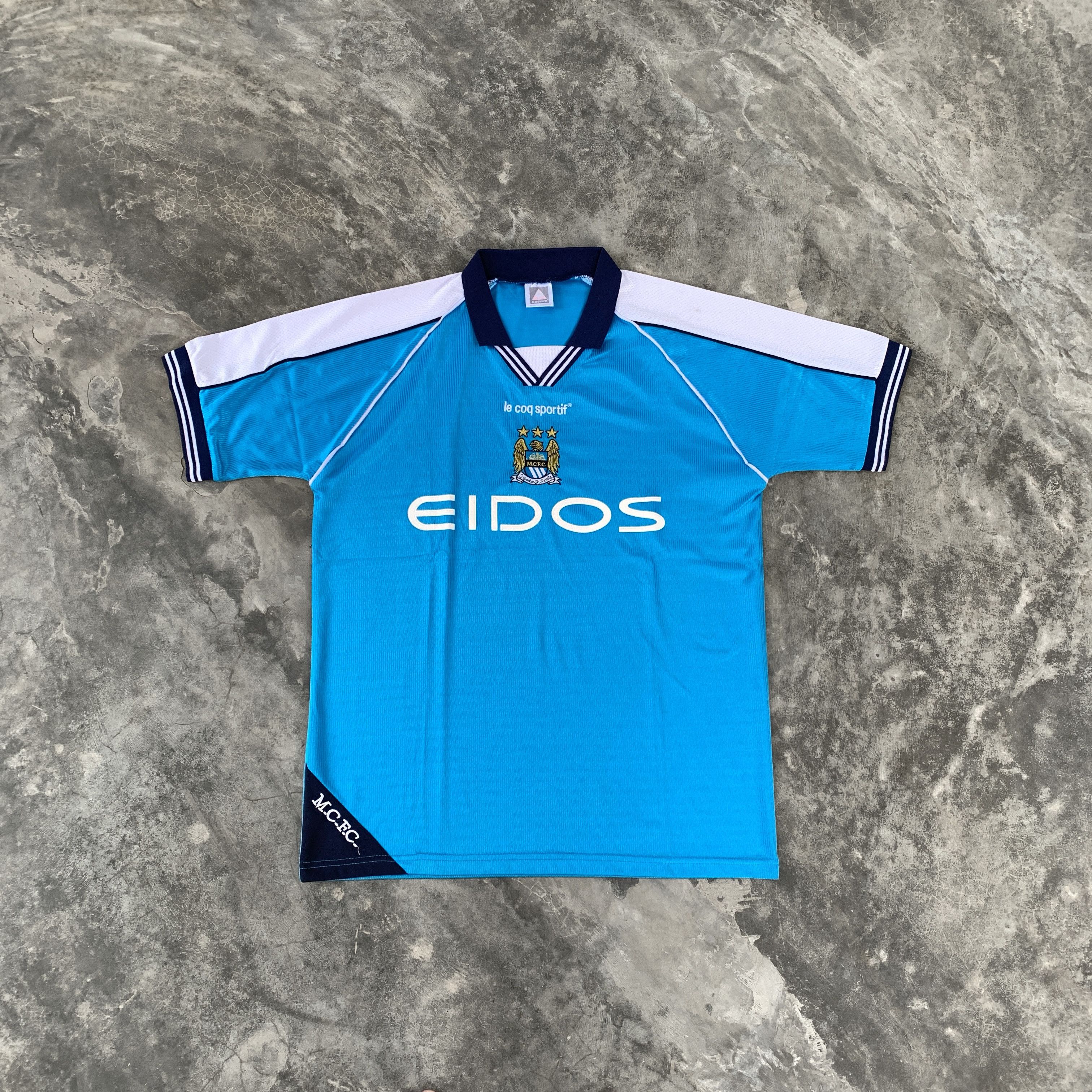 Le Coq Sportif VINTAGE LE COQ SPORTIF MANCHESTER CITY 1999-2001 HOME JERSEY Size US L / EU 52-54 / 3 - 1 Thumbnail