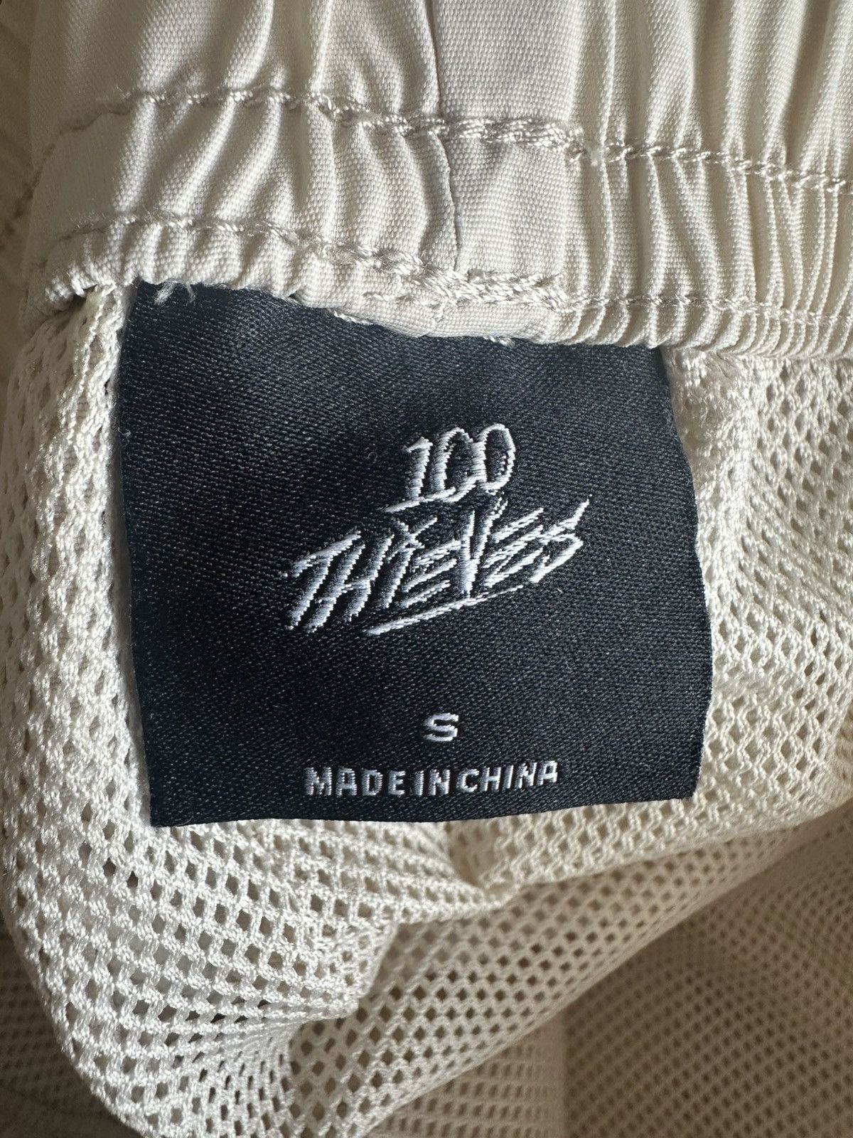 100 Thieves 100 Thieves Foundations Nylon Shorts — Cream (S) Size US 30 / EU 46 - 5 Thumbnail