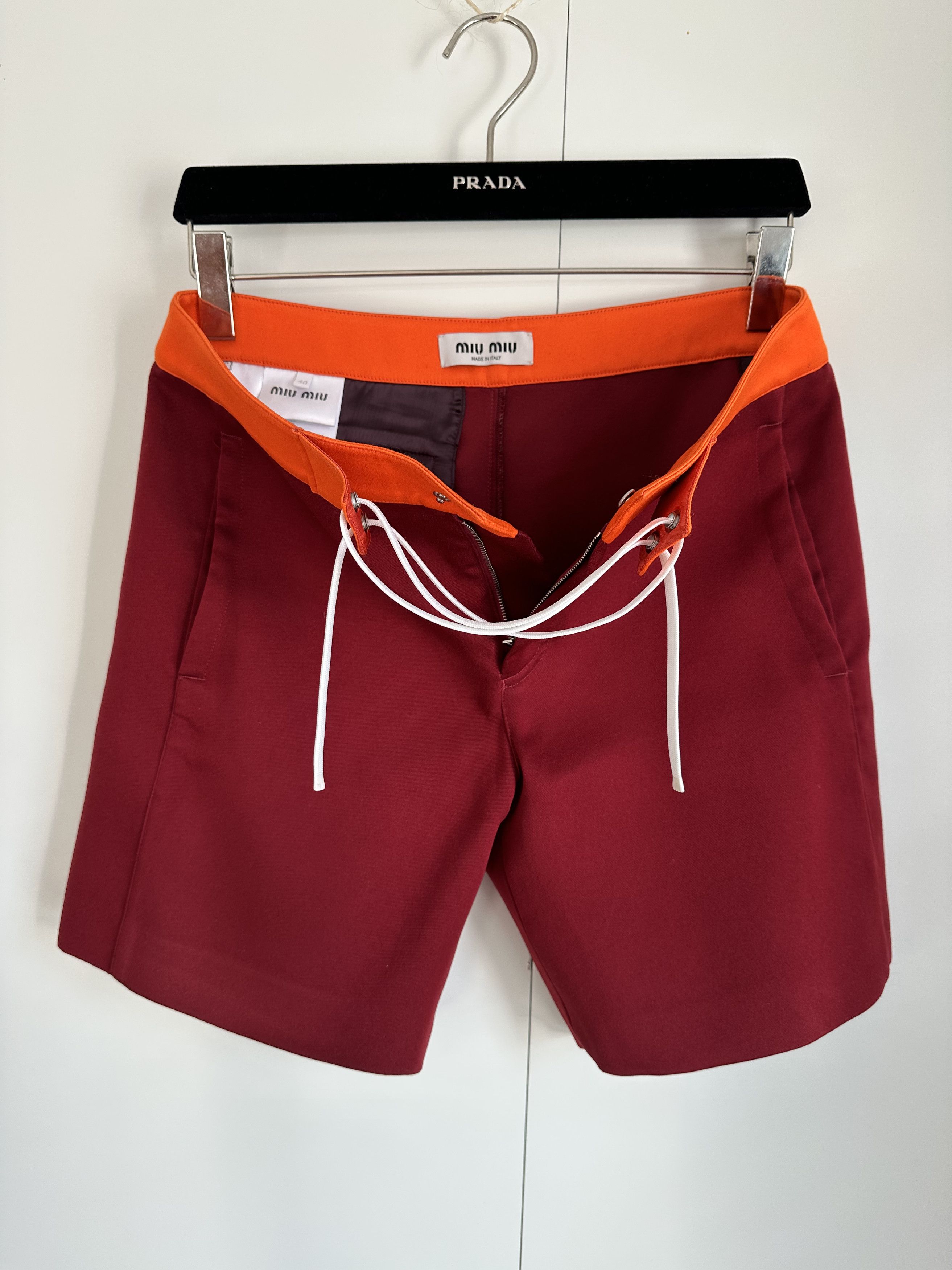 Miu Miu From the SS24 runway contrasting-waistband shorts $ 1,820 Size 30" / US 8 / IT 44 - 9 Thumbnail