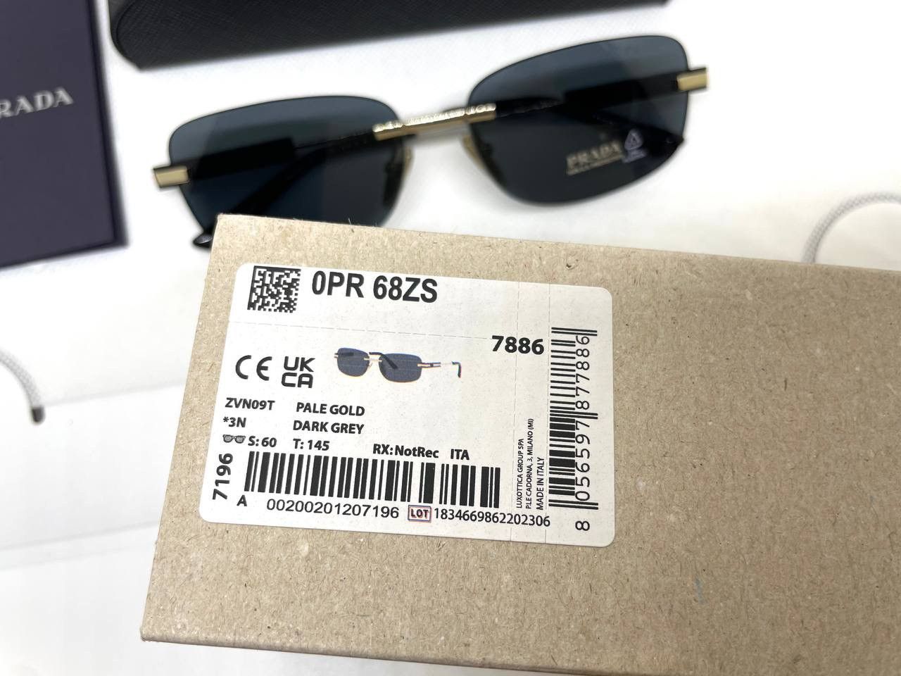 Prada Prada Sunglasses with iconic metal plaque PR68ZS ZVN09T Size ONE SIZE - 10 Thumbnail