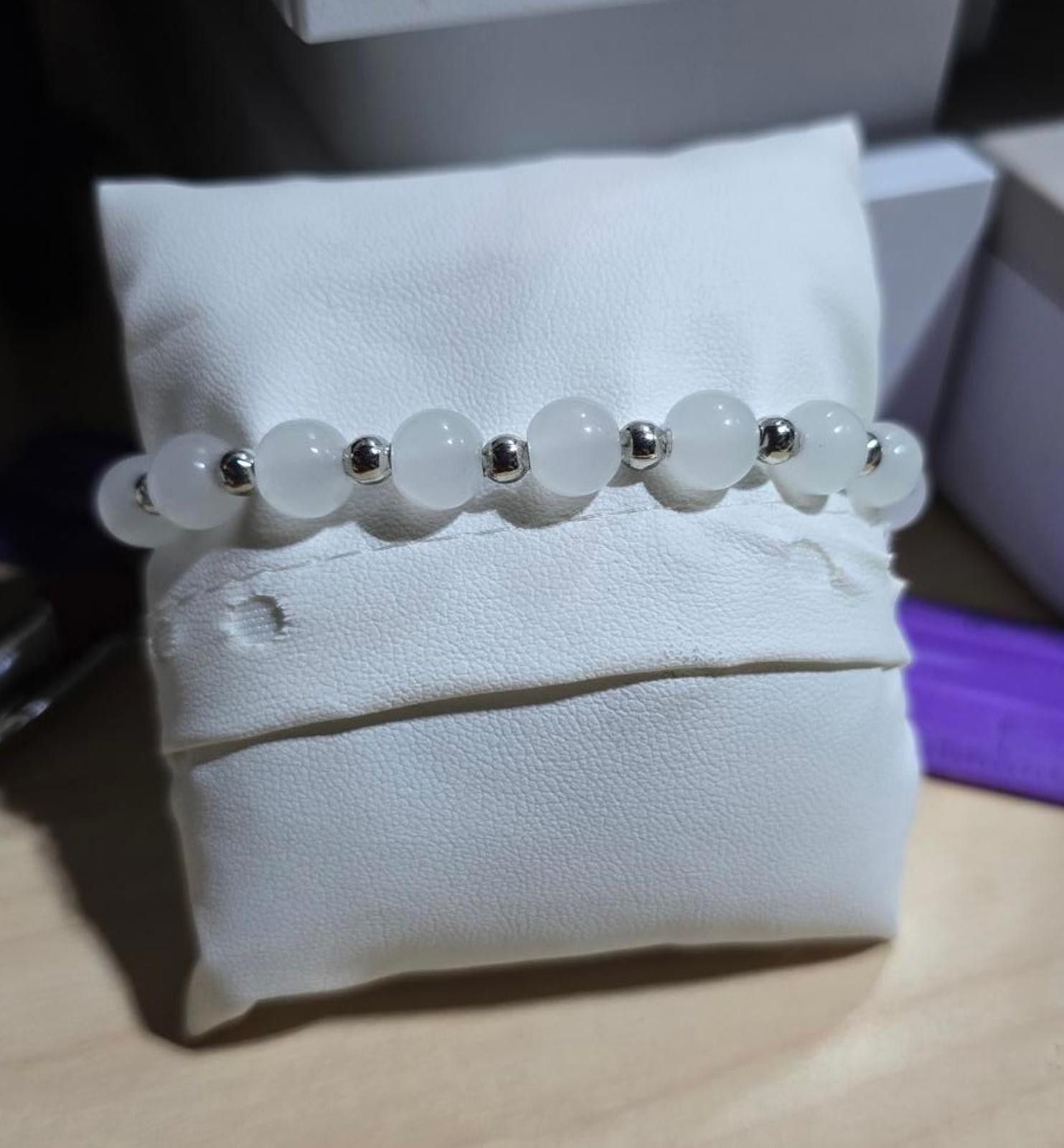The Unbranded Brand Elegant White Beaded Bracelet with Silver Accents and Charms Size ONE SIZE - 2 Thumbnail