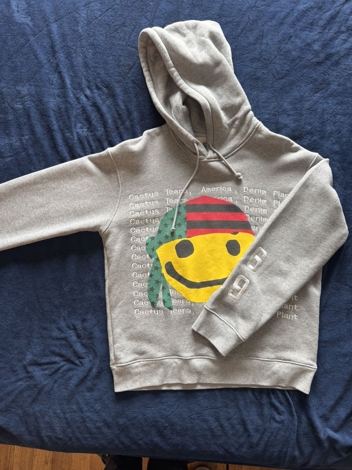 Cactus Plant Flea Market  DENIM TEARS CPFM X DENIM TEARS Hoodie | Grailed
