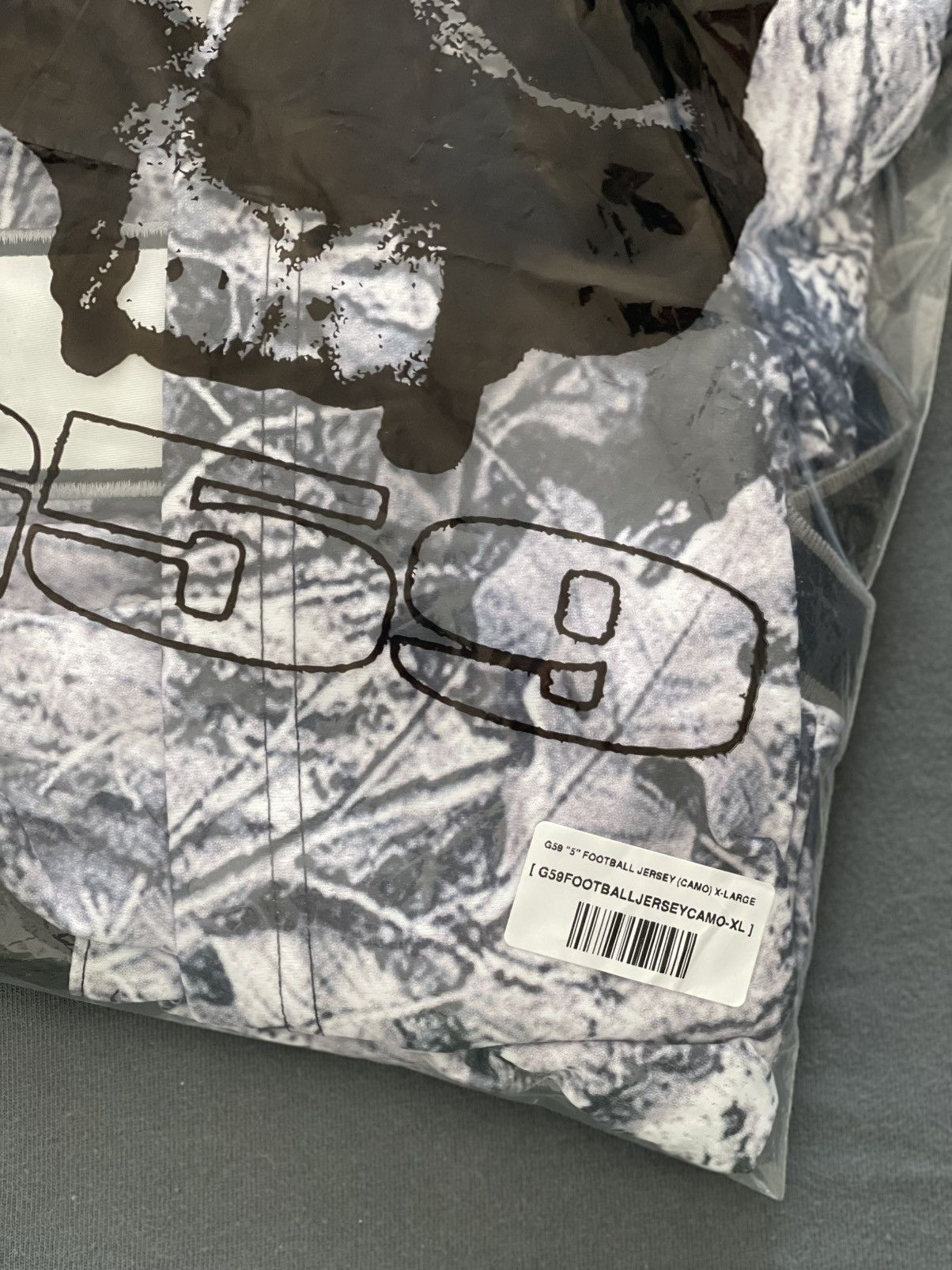 G59 Records G59 “5” FOOTBALL JERSEY (CAMO) Size US XL / EU 56 / 4 - 10 Thumbnail