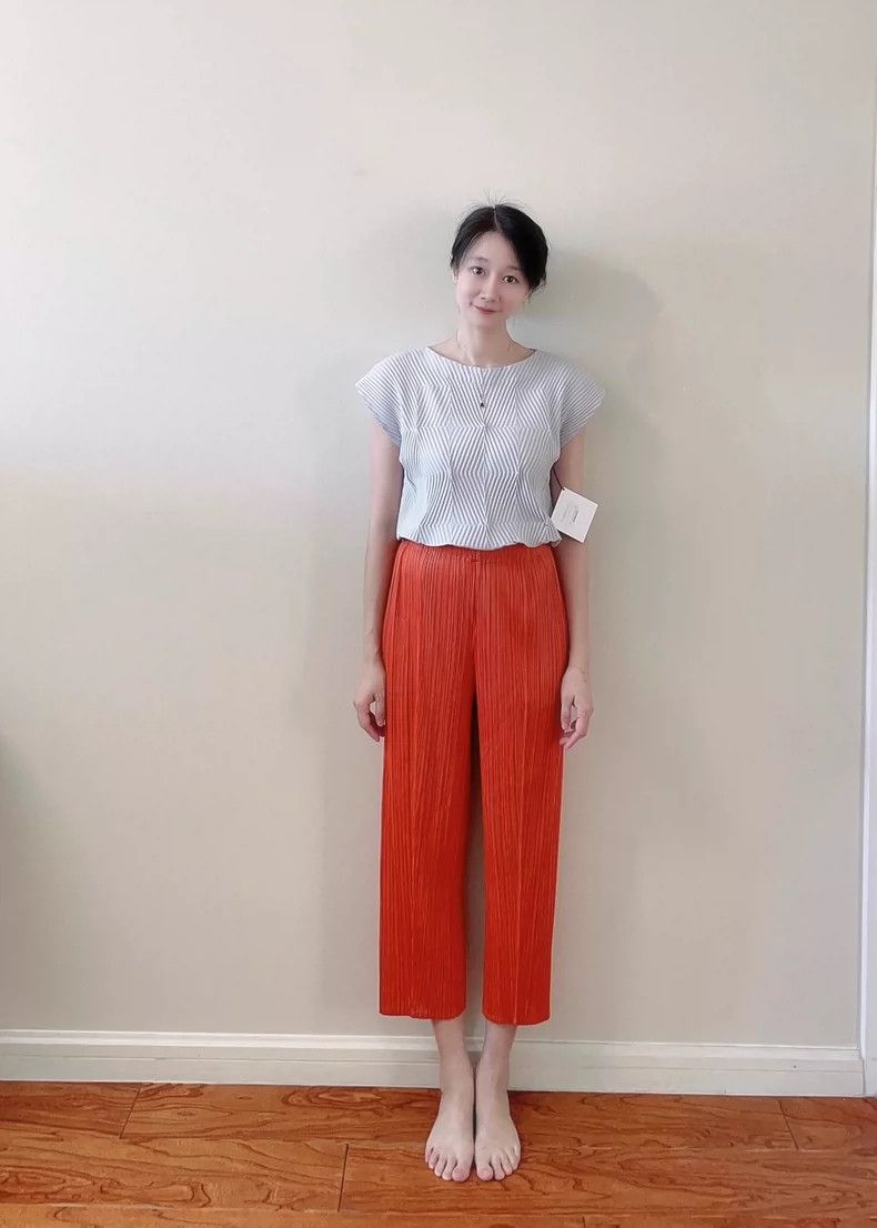 Issey Miyake Issey Miyake size:3 Orange pleated trousers Size 22" - 1 Thumbnail