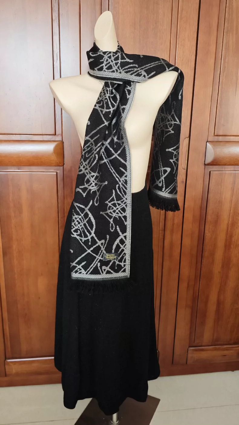 Vivienne Westwood Saturn graffiti double-sided tassel scar